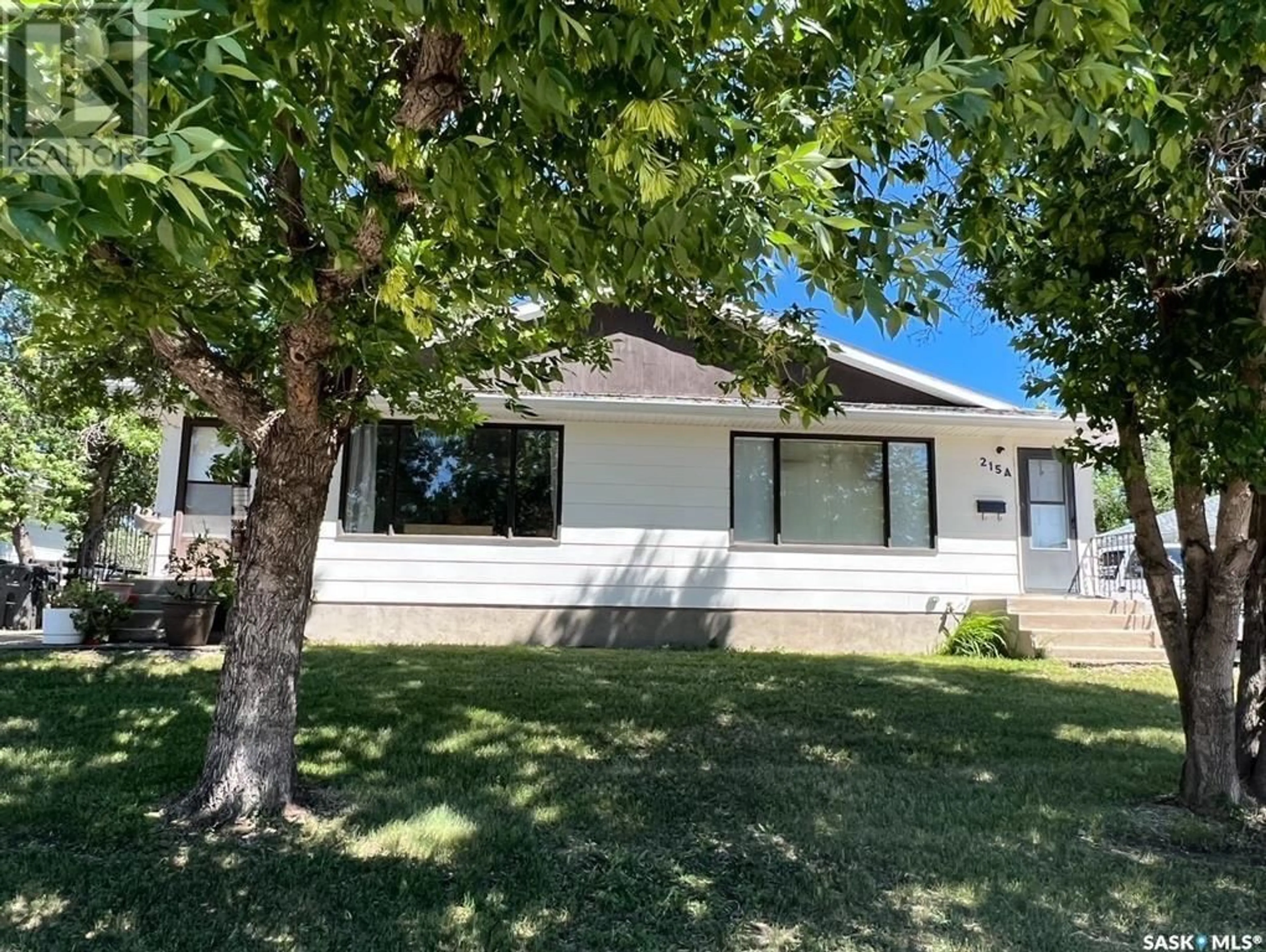 A pic from outside/outdoor area/front of a property/back of a property/a pic from drone, street for 215 PELLETIER DRIVE, Swift Current Saskatchewan S9H4K3