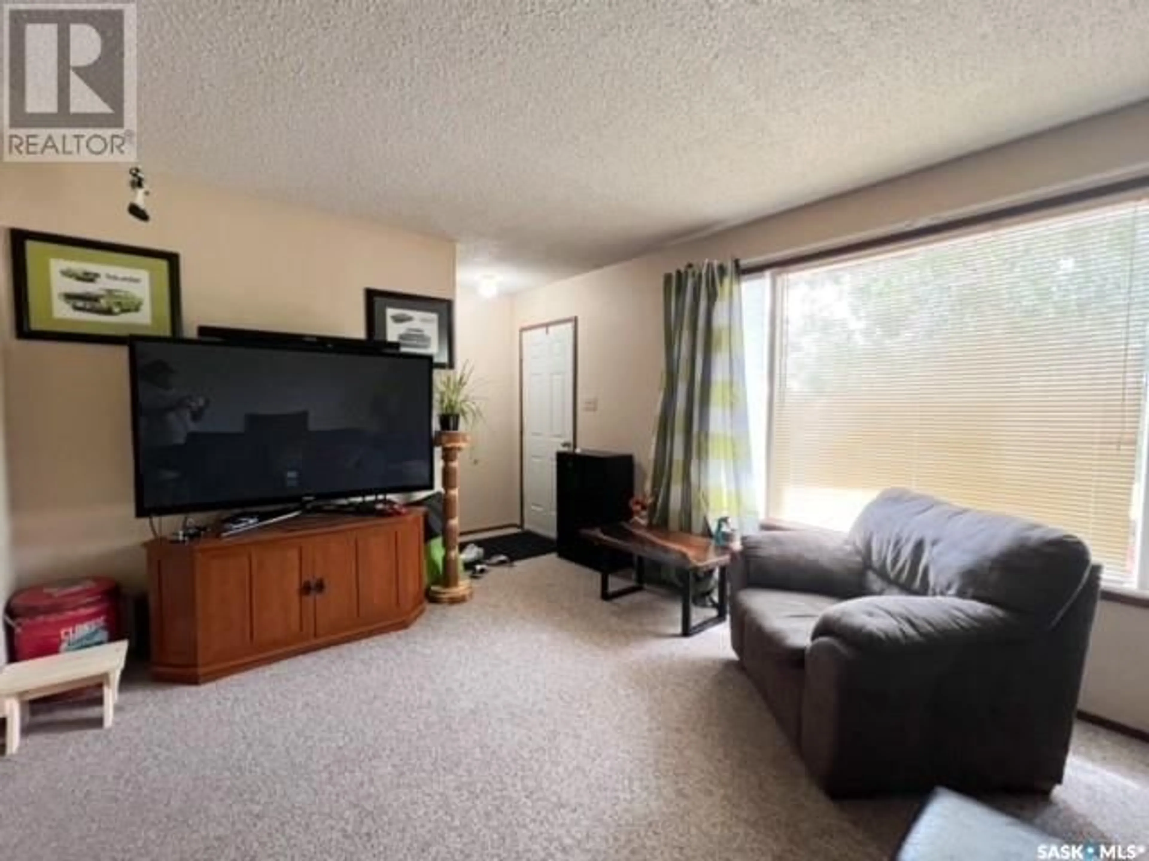 Living room with furniture, unknown for 215 PELLETIER DRIVE, Swift Current Saskatchewan S9H4K3