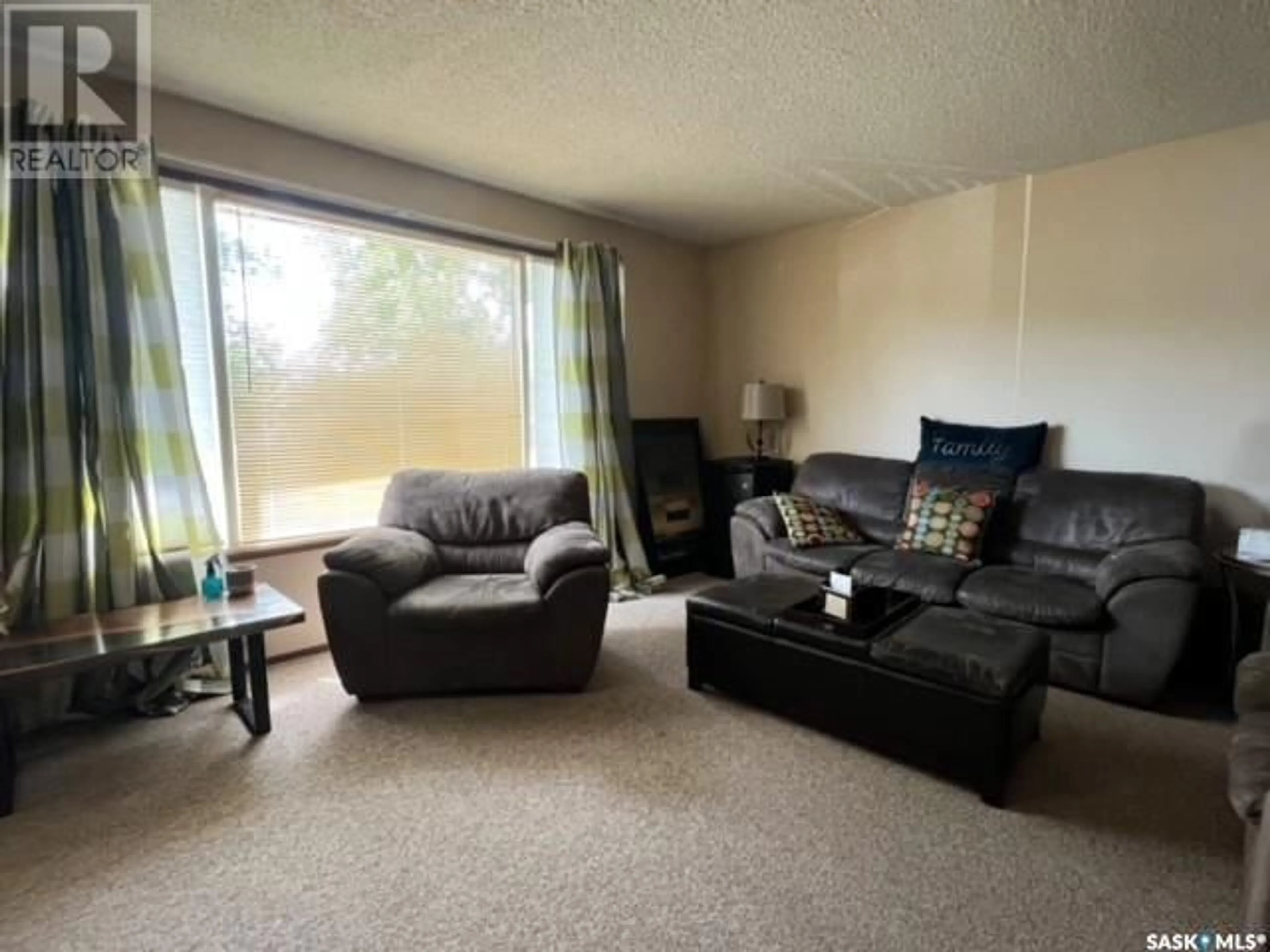 Living room with furniture, unknown for 215 PELLETIER DRIVE, Swift Current Saskatchewan S9H4K3