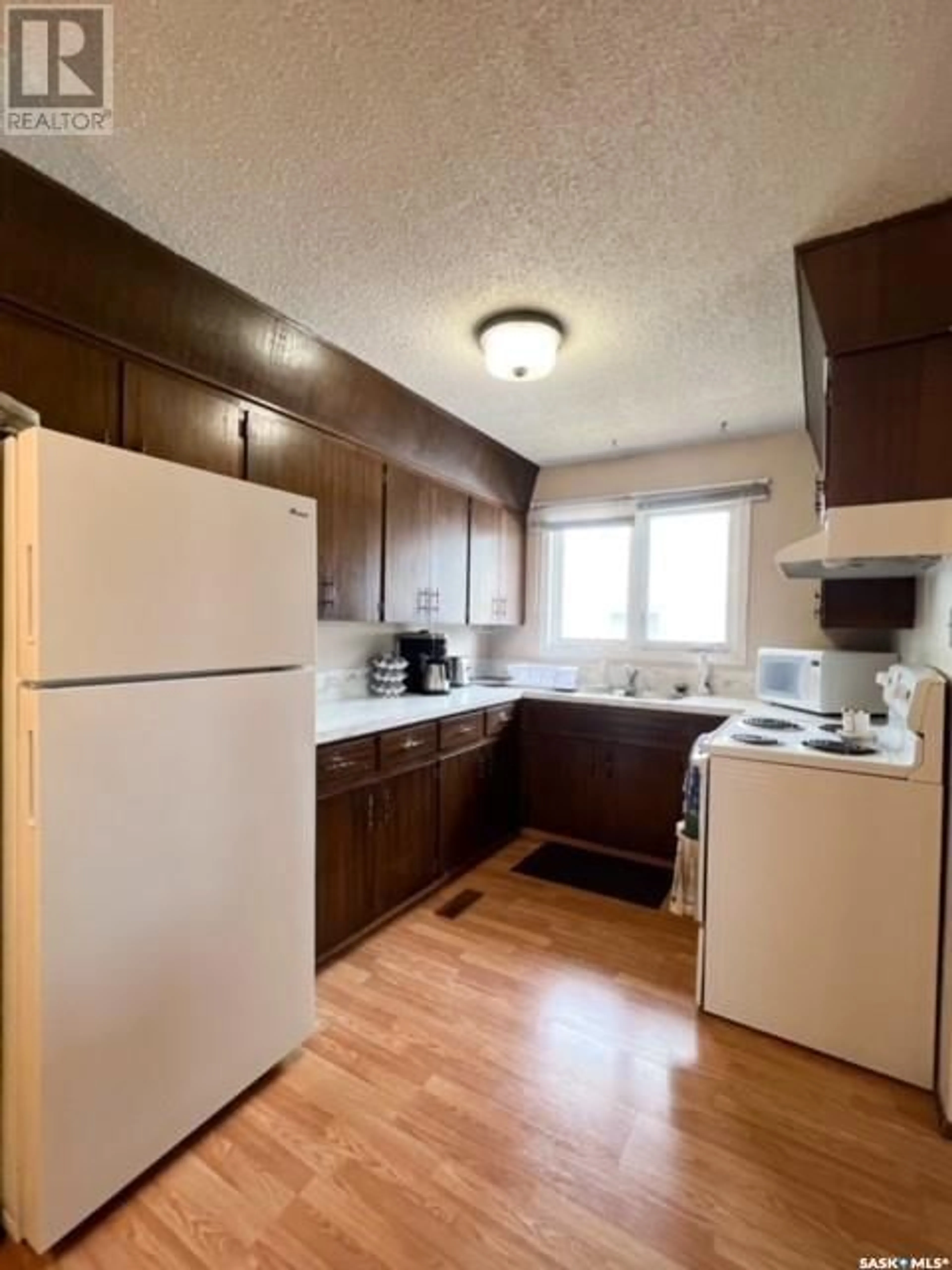 Standard kitchen, wood/laminate floor for 215 PELLETIER DRIVE, Swift Current Saskatchewan S9H4K3