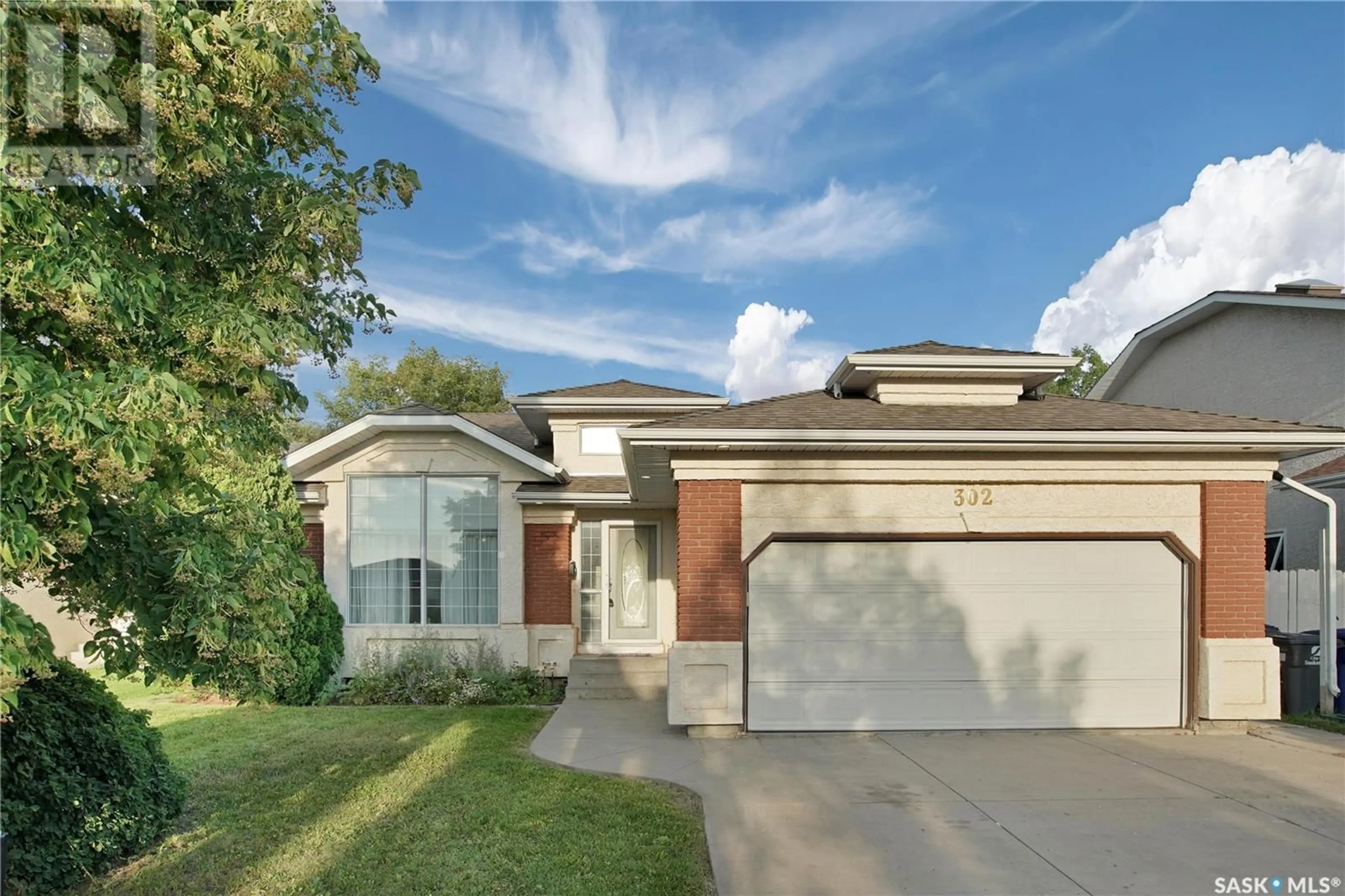Home with brick exterior material, street for 302 BLACKTHORN CRESCENT, Saskatoon Saskatchewan S7B1V1