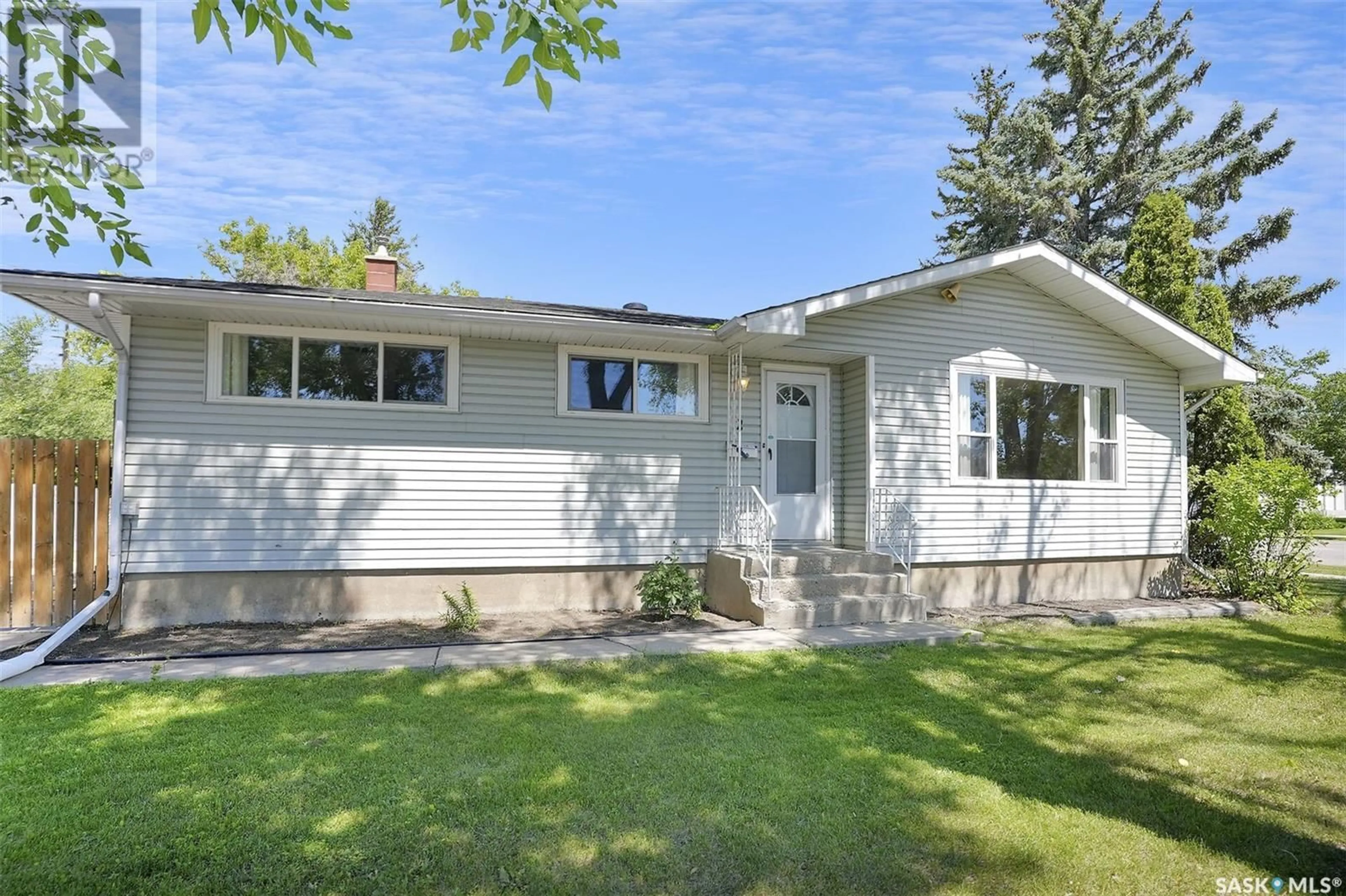 Home with vinyl exterior material, street for 2 DONAHUE AVENUE, Regina Saskatchewan S4R3X5
