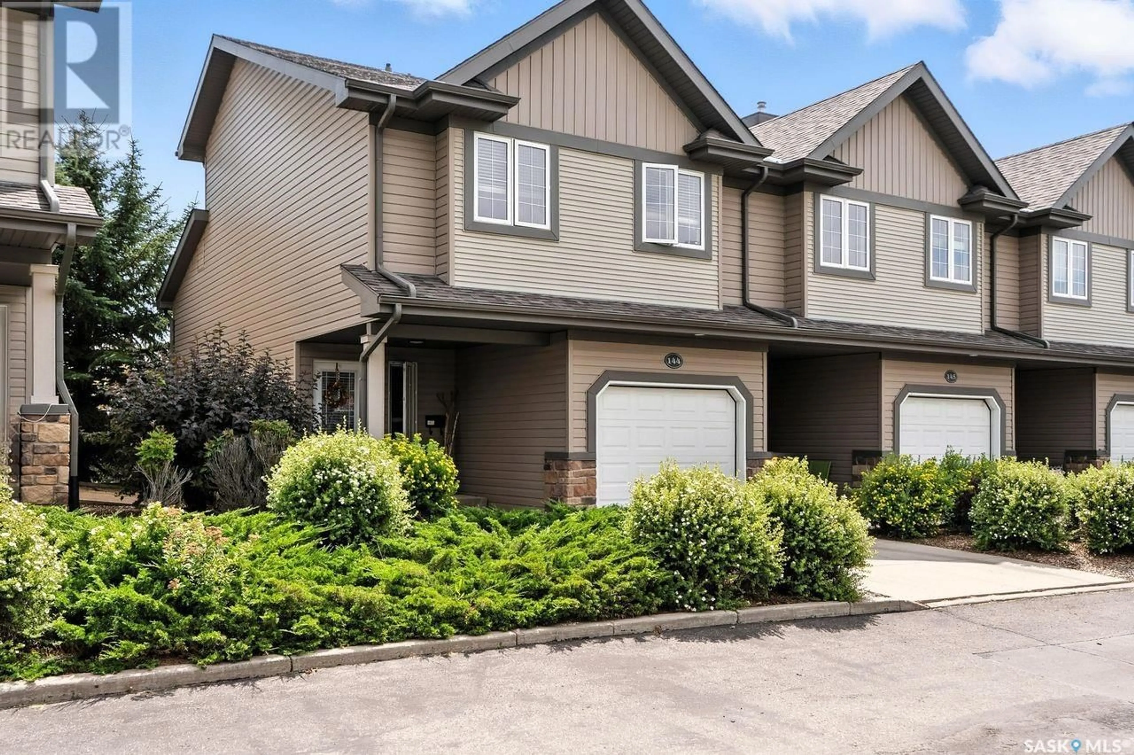 Home with vinyl exterior material, street for 615 - 144 STENSRUD ROAD, Saskatoon Saskatchewan S7W0A1