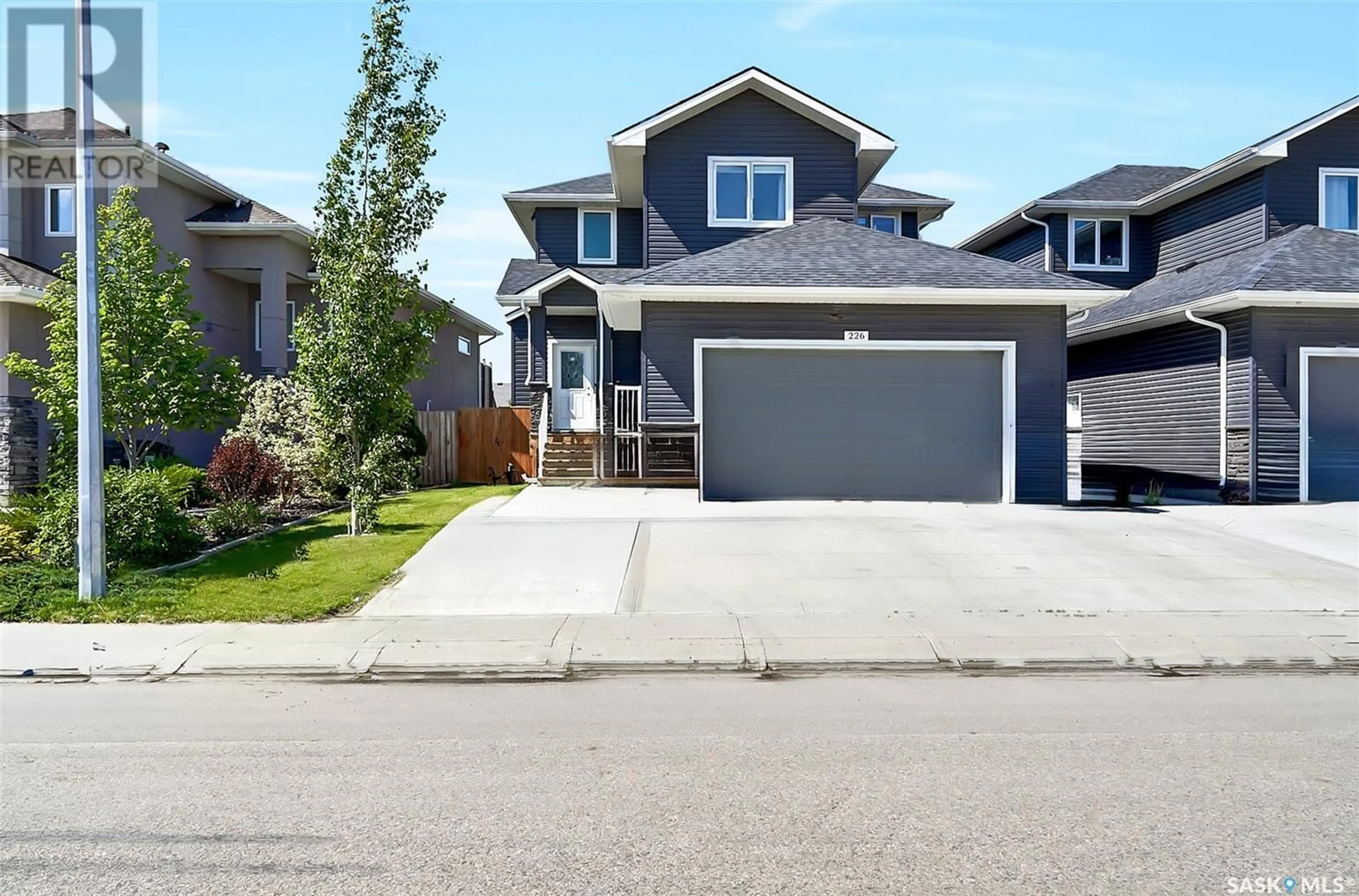 Home with vinyl exterior material, street for 226 GILLIES STREET, Saskatoon Saskatchewan S7V0J7