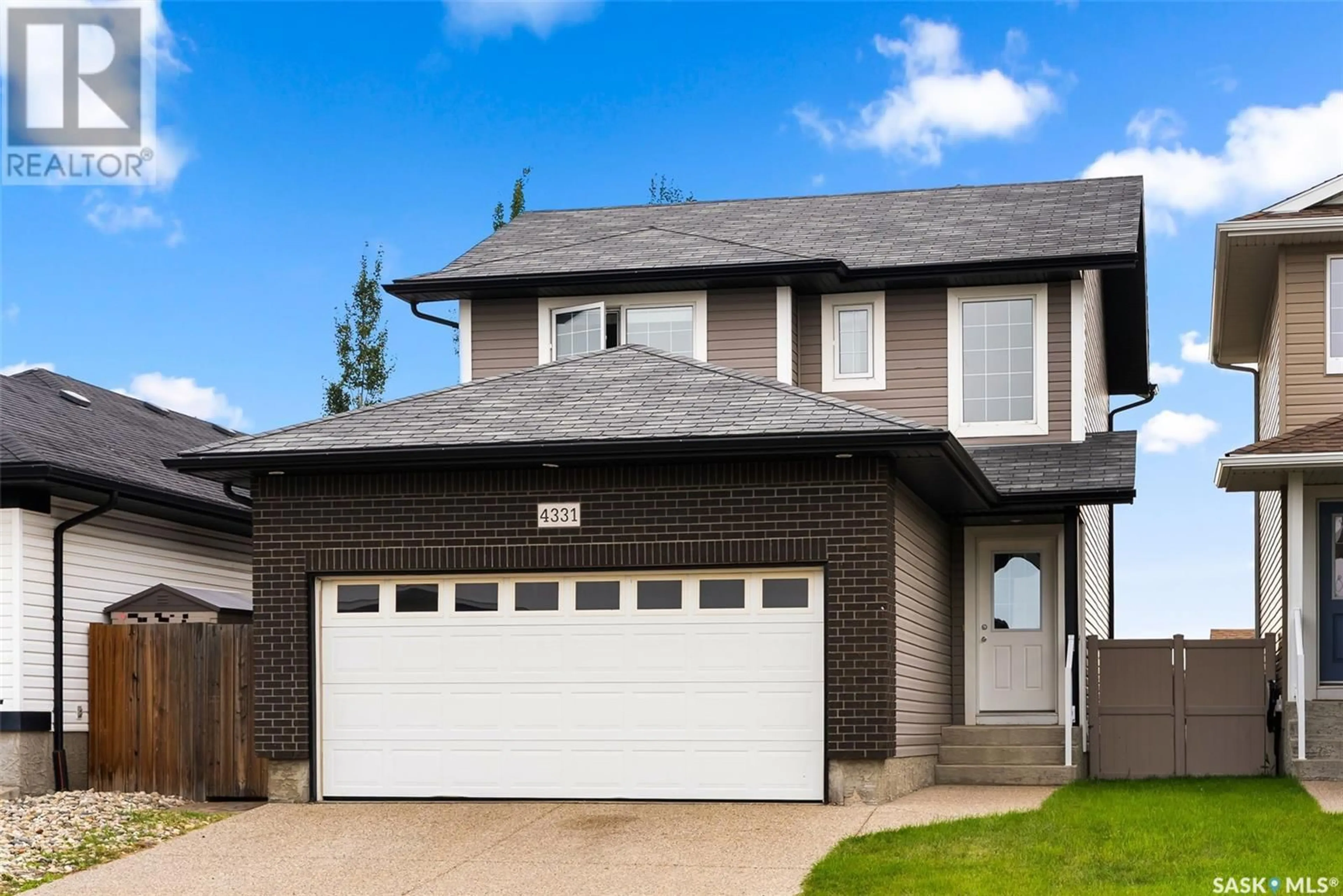 Home with vinyl exterior material, street for 4331 NICUITY DRIVE, Regina Saskatchewan S4X0C1