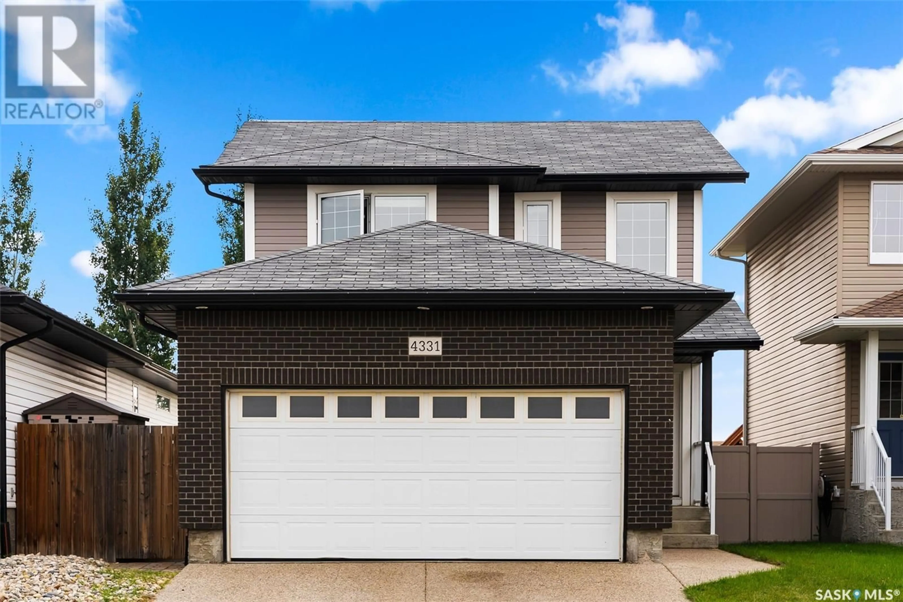 Home with vinyl exterior material, street for 4331 NICUITY DRIVE, Regina Saskatchewan S4X0C1