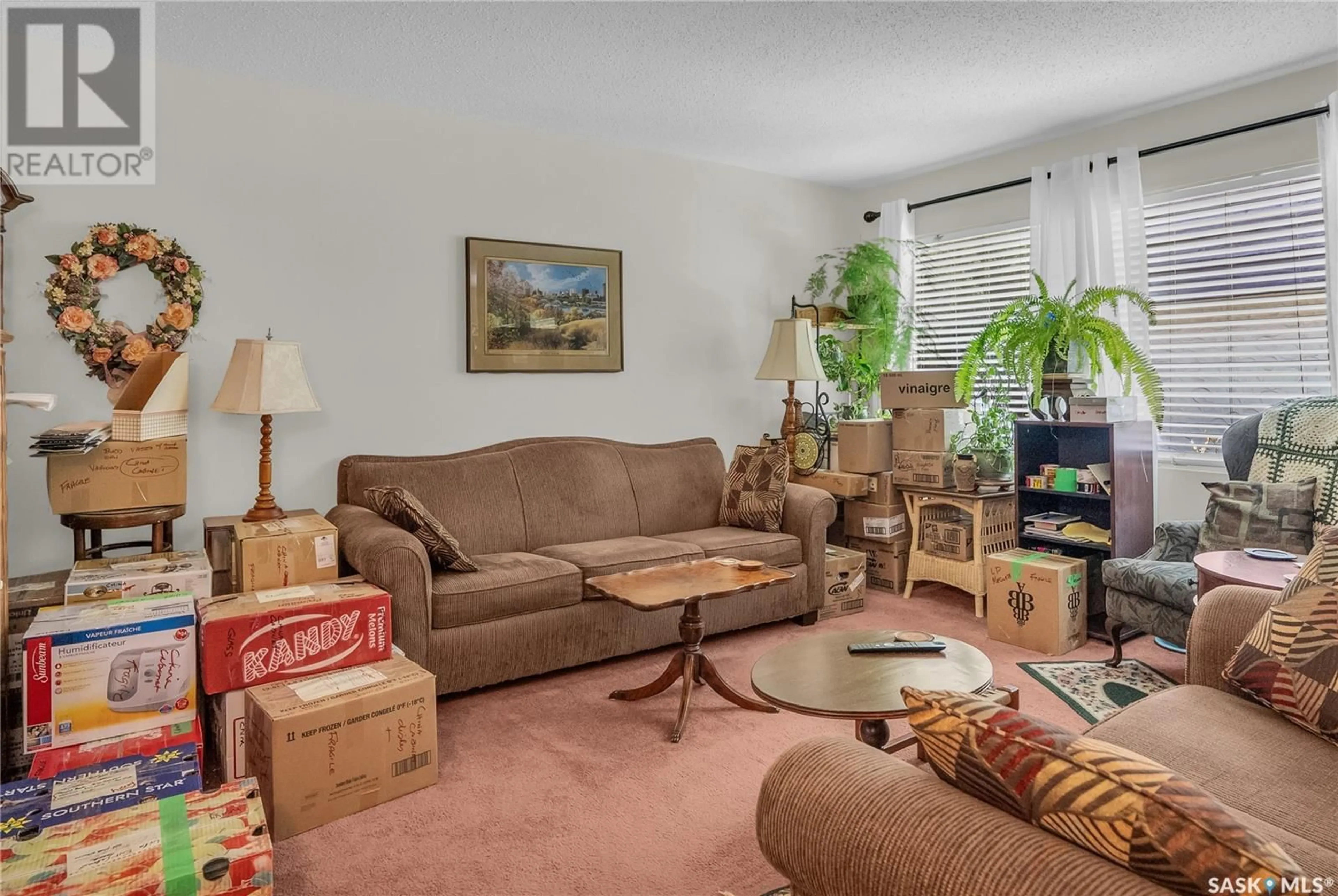 Living room with furniture, carpet floor for 36 120 ACADIA DRIVE, Saskatoon Saskatchewan S7H3V2