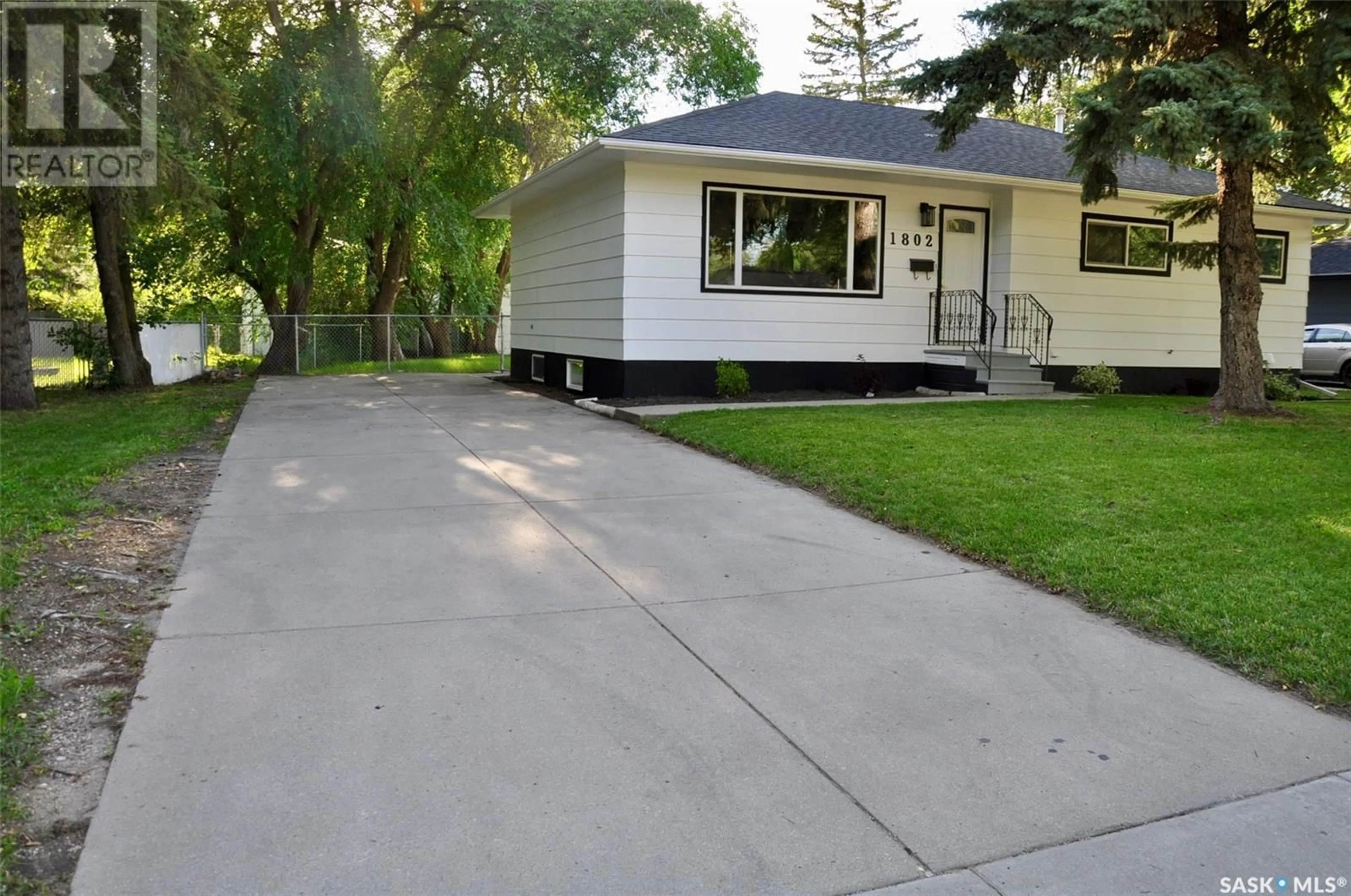 Home with vinyl exterior material, street for S - 1802 PRESTON AVENUE, Saskatoon Saskatchewan S7H2V8