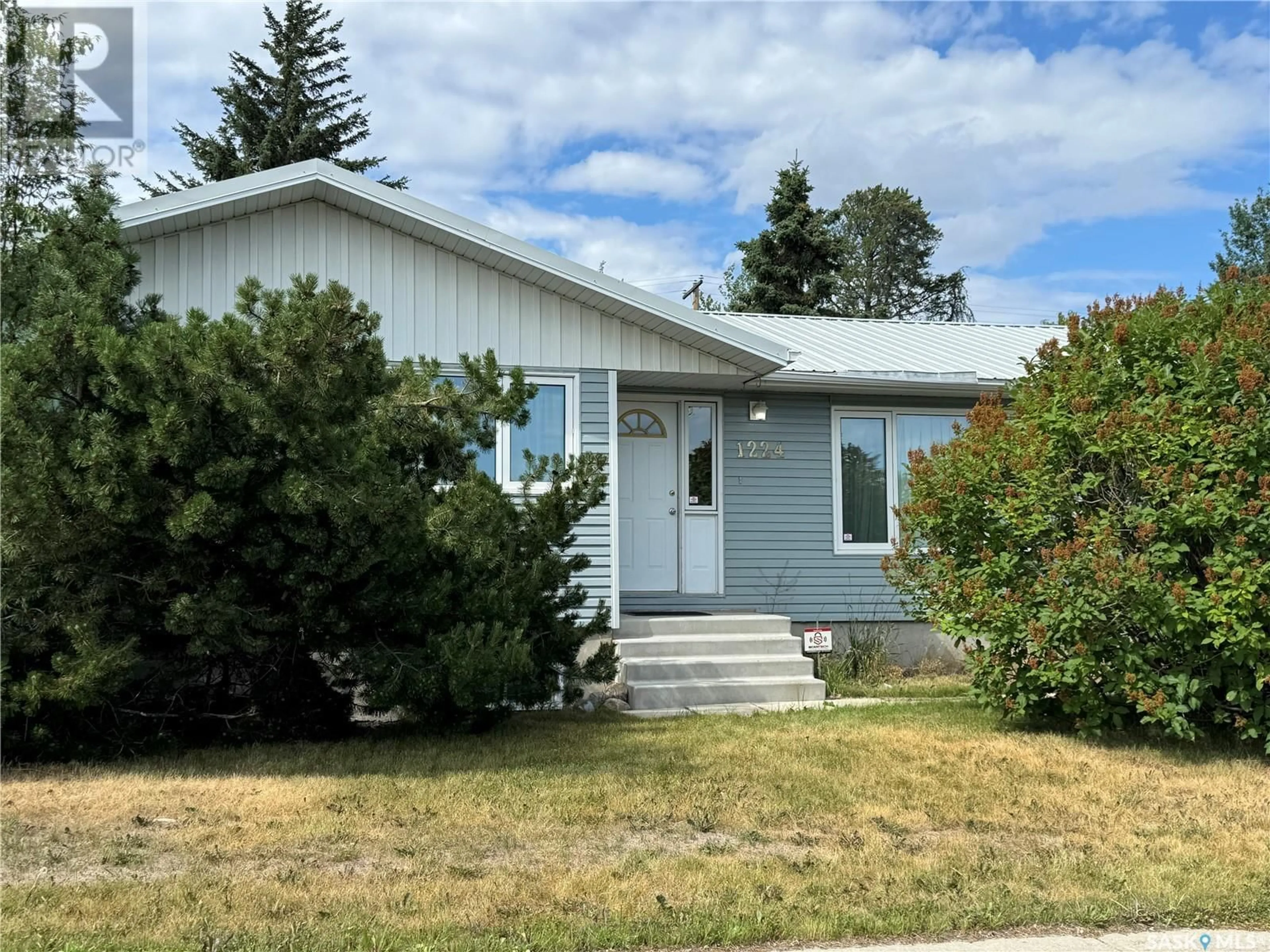 Home with vinyl exterior material, street for 1224 SCHOOL AVENUE, La Ronge Saskatchewan S0J1L0