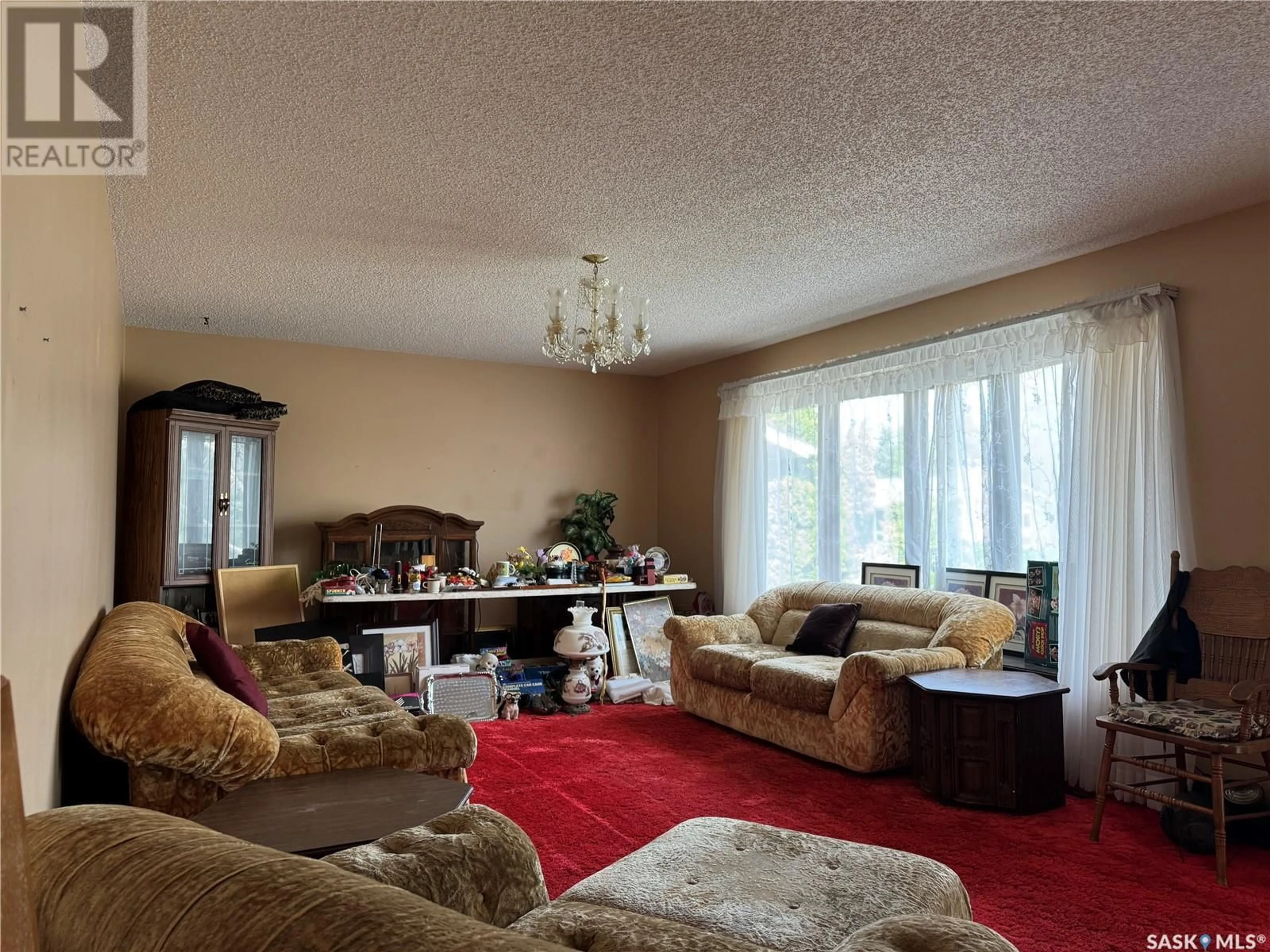 Living room with furniture, unknown for 417 MILLER CRESCENT, Wynyard Saskatchewan S0A4T0