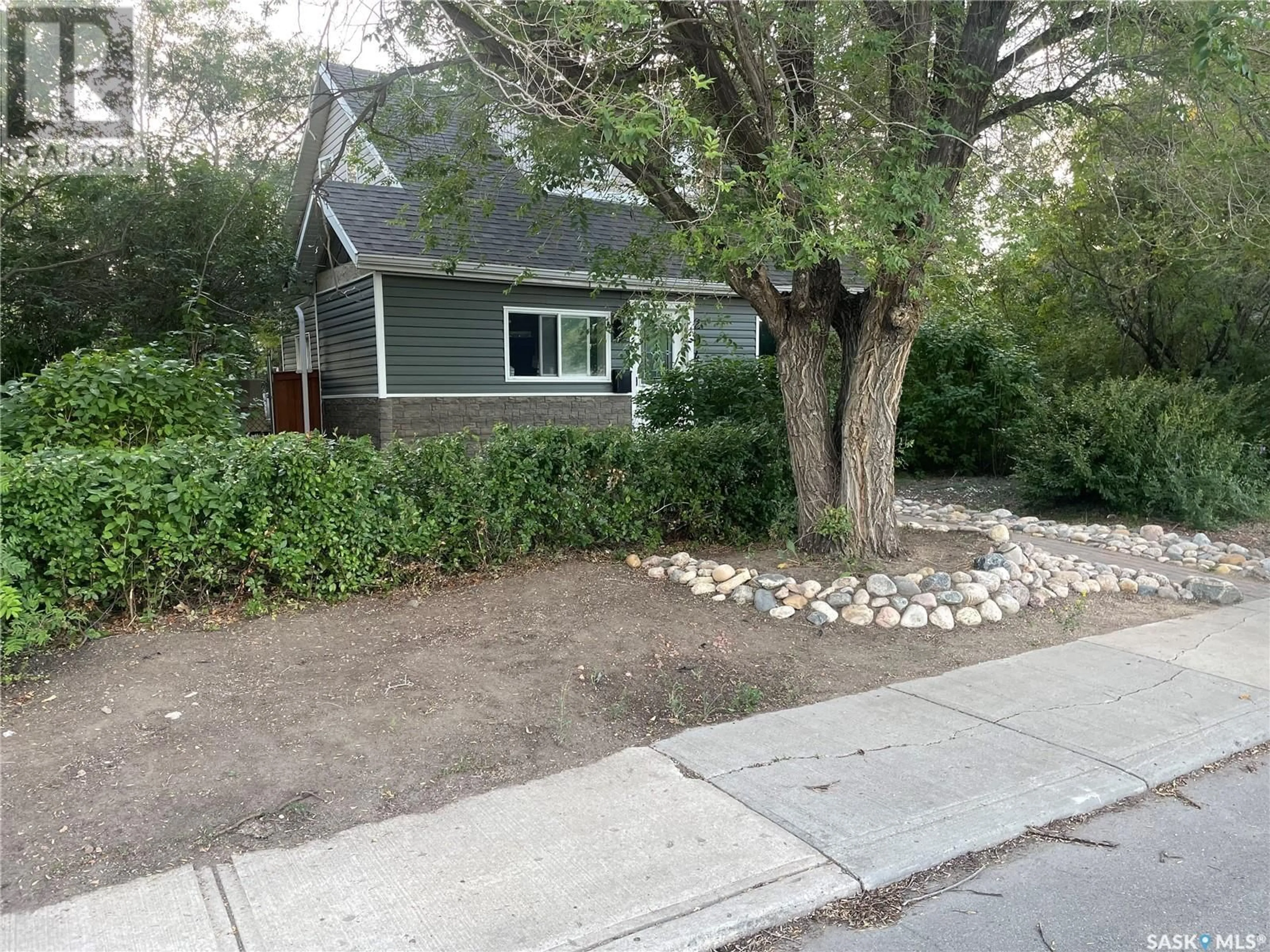 A pic from outside/outdoor area/front of a property/back of a property/a pic from drone, street for 2040 ALEXANDRA STREET, Regina Saskatchewan S4T4P5