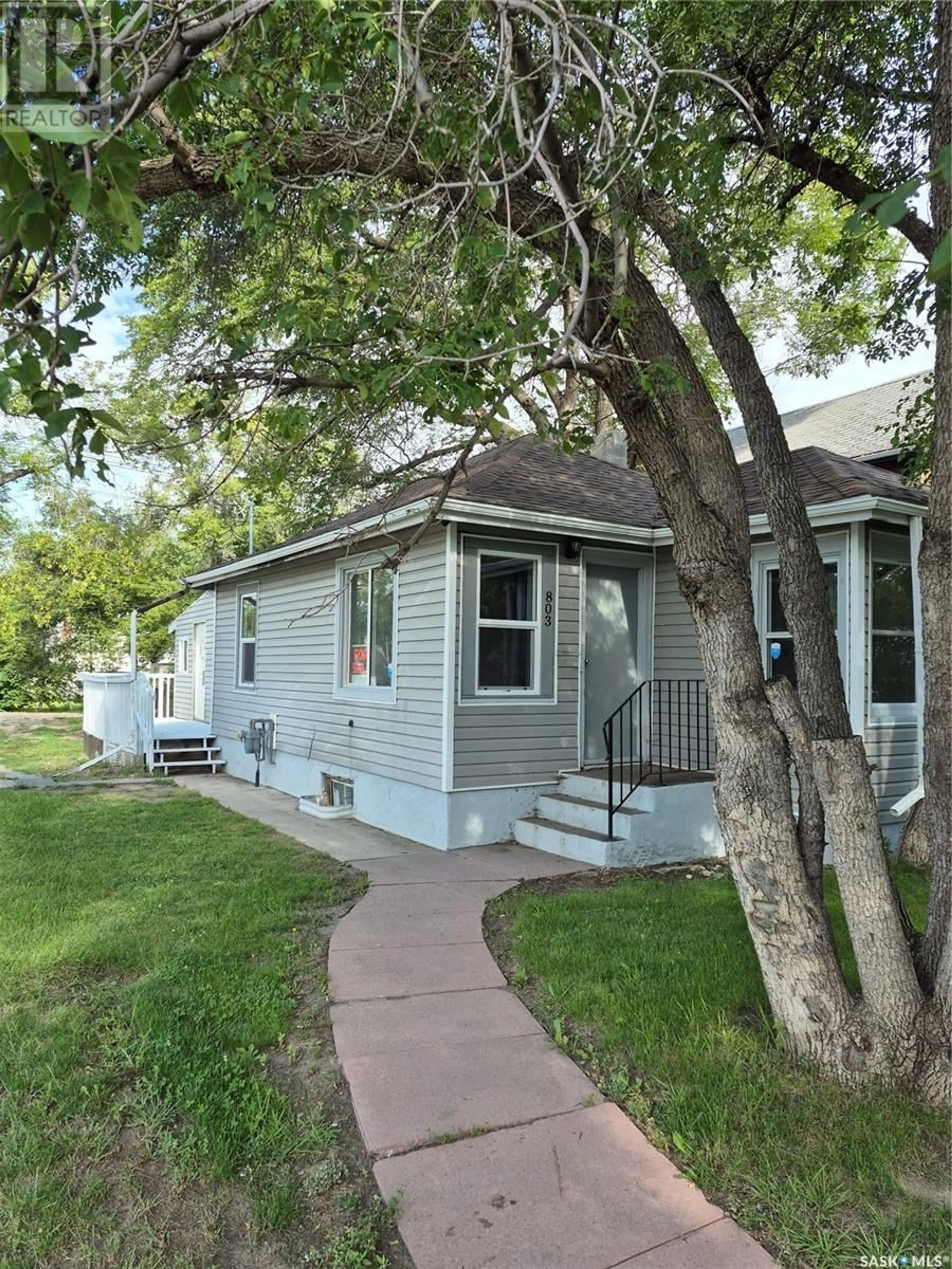 Home with vinyl exterior material, street for 803 I AVENUE, Saskatoon Saskatchewan S7L2H2