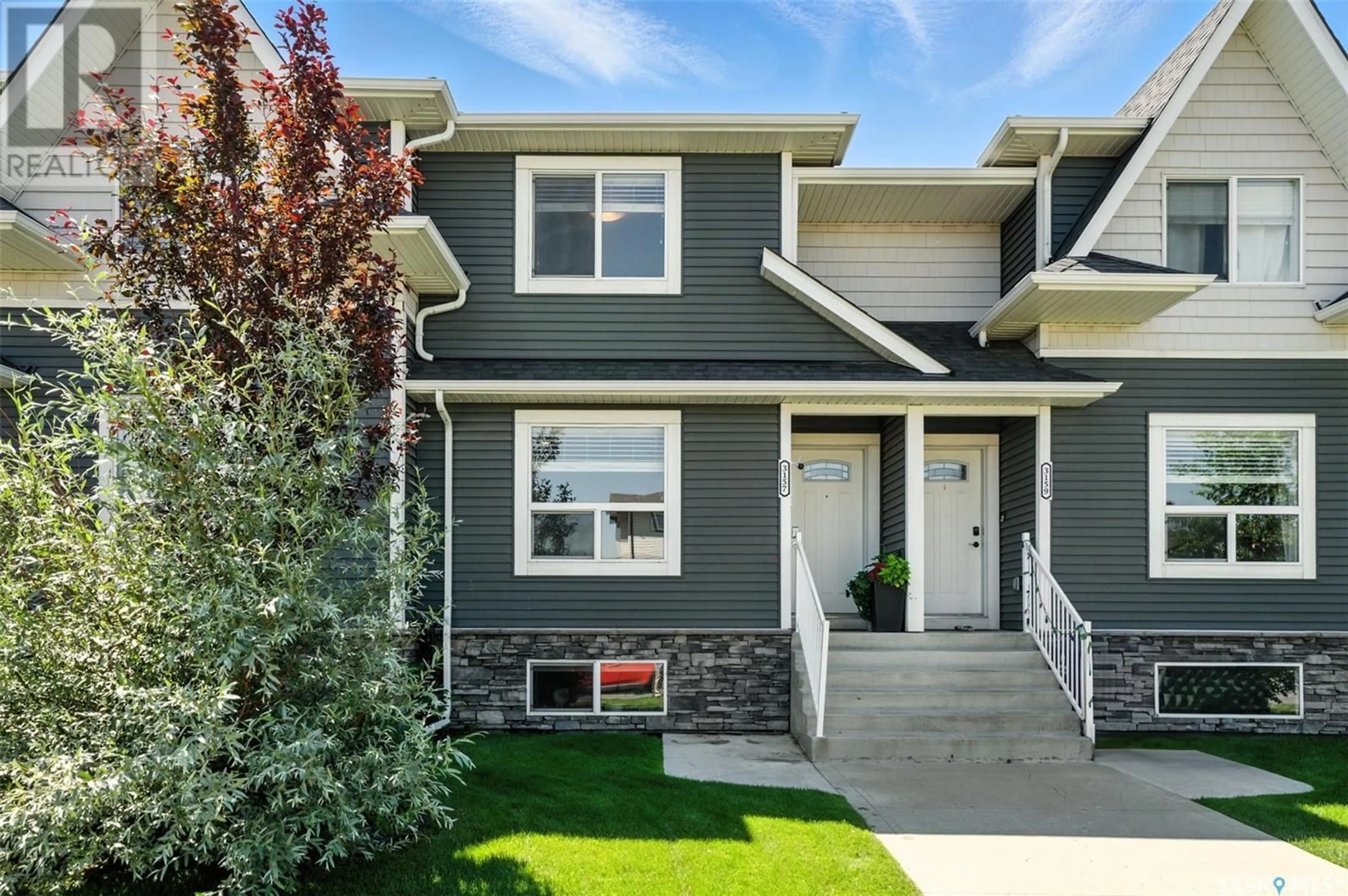 Home with vinyl exterior material, street for 3157 MCCLOCKLIN ROAD, Saskatoon Saskatchewan S7R0J1