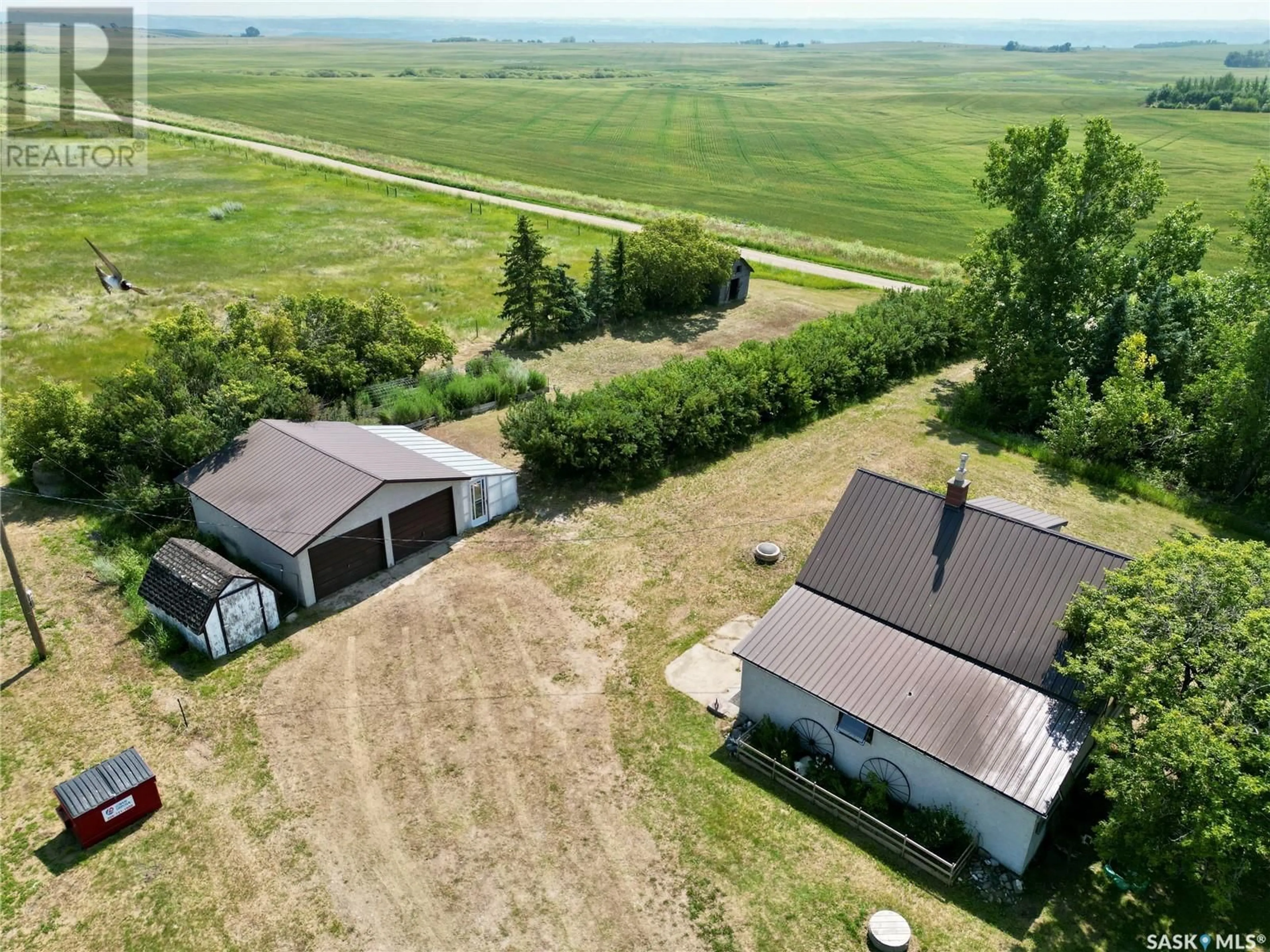 A pic from outside/outdoor area/front of a property/back of a property/a pic from drone, unknown for GIBSON ACREAGE, Longlaketon Rm No. 219 Saskatchewan S0G1J0