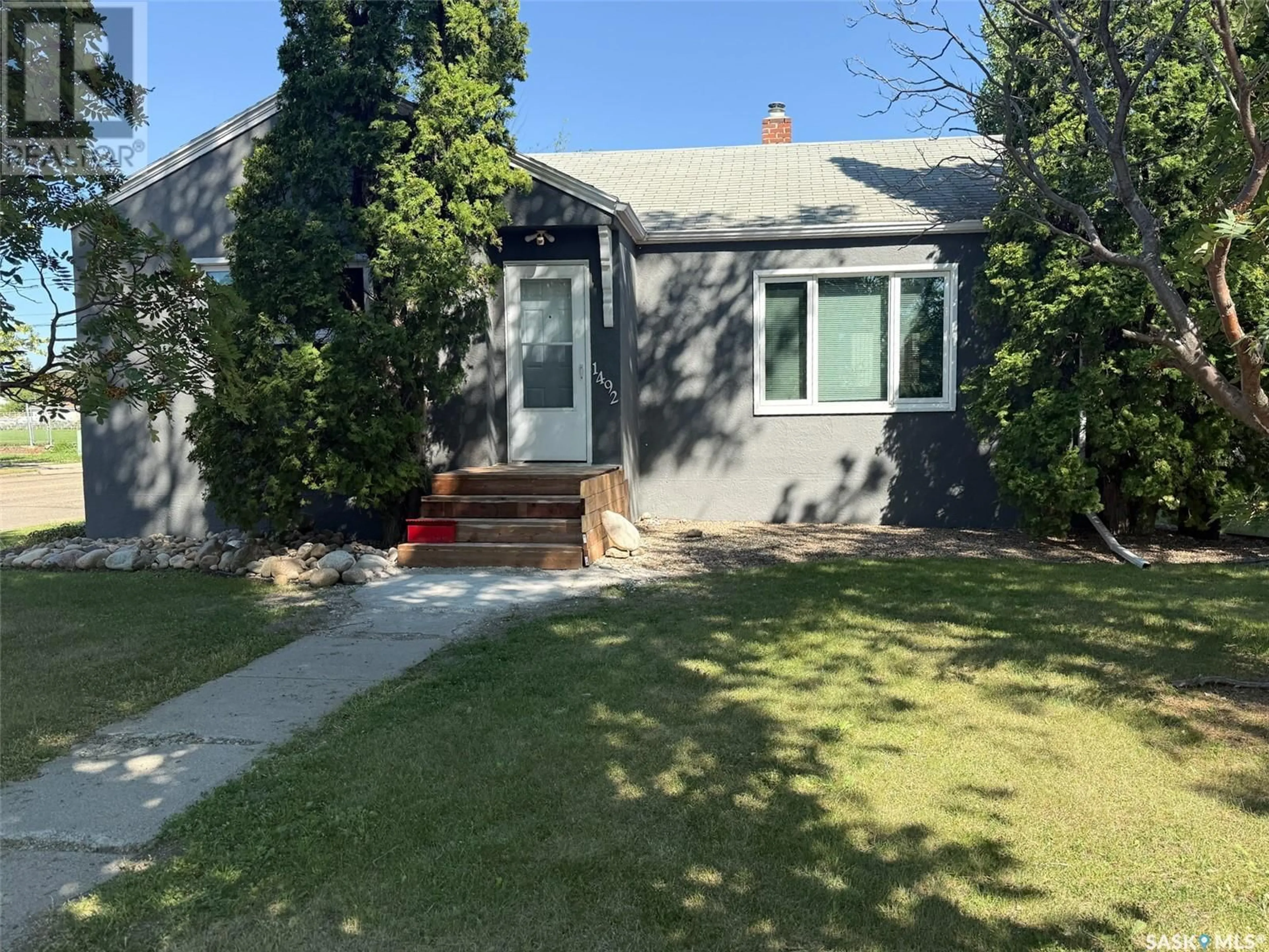 A pic from outside/outdoor area/front of a property/back of a property/a pic from drone, street for 1492 95TH STREET, North Battleford Saskatchewan S9A0G6