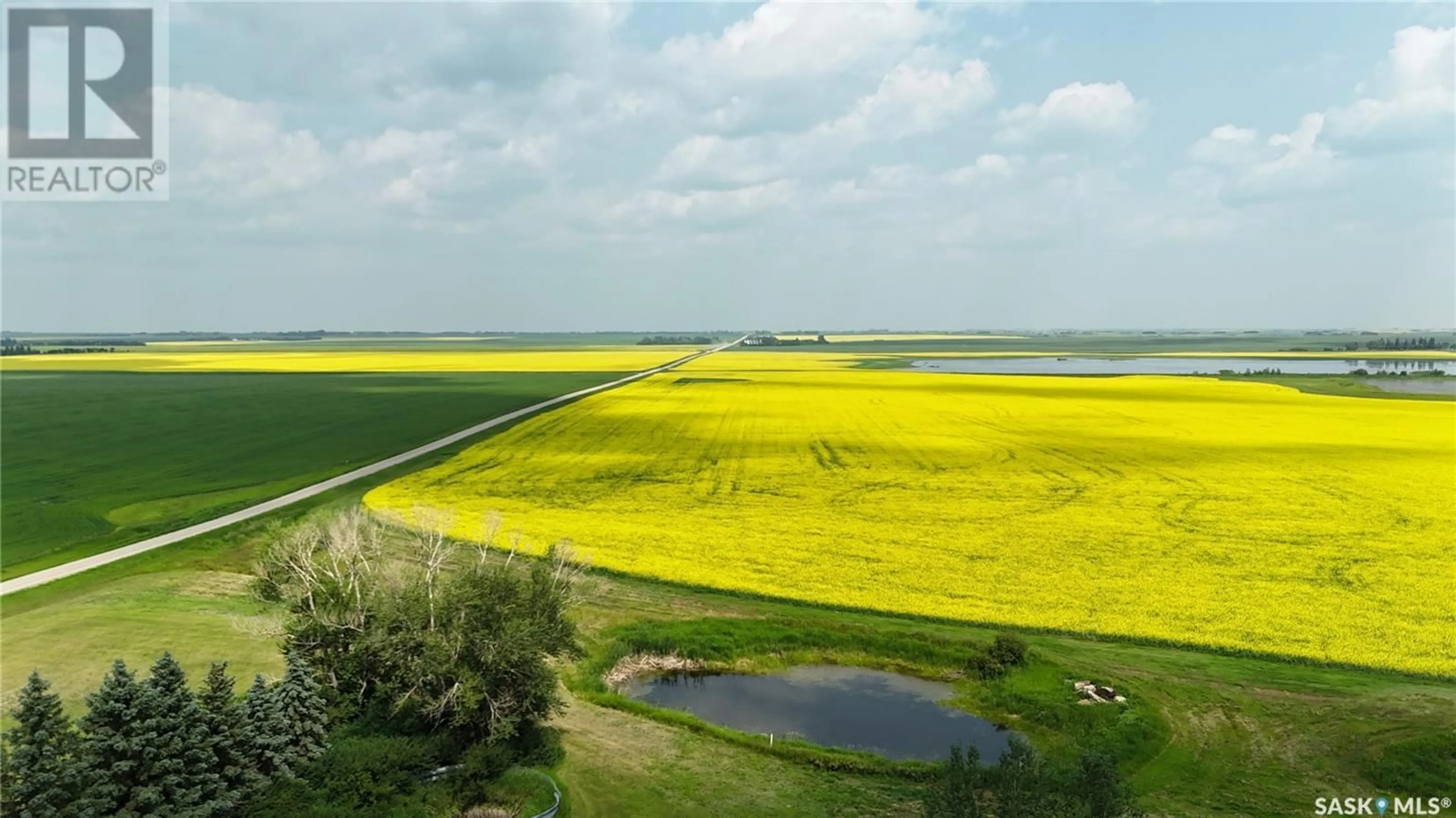 A pic from outside/outdoor area/front of a property/back of a property/a pic from drone, water/lake/river/ocean view for KOZAN ACREAGE, Cupar Rm No. 218 Saskatchewan S0G0Y0