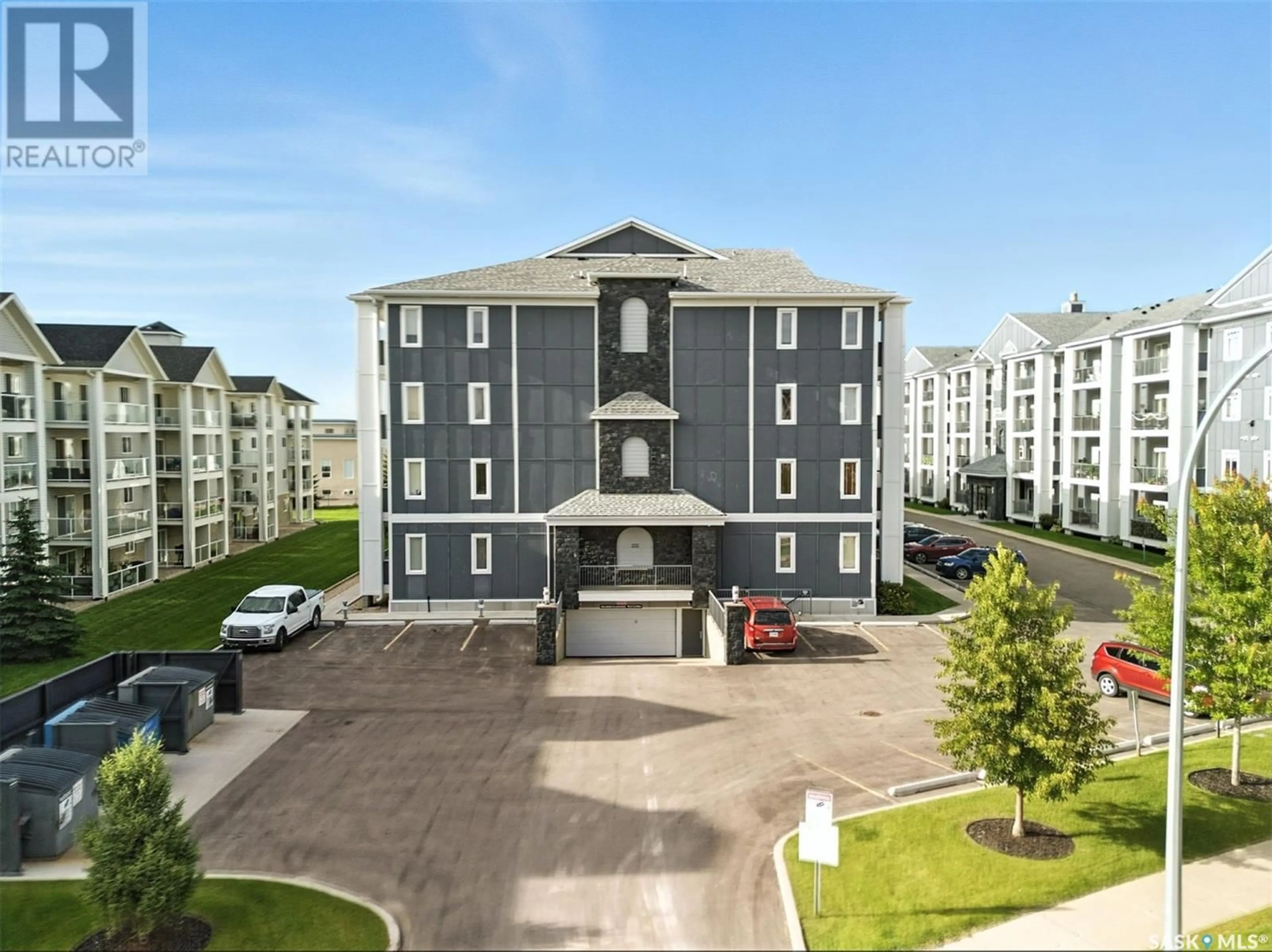A pic from outside/outdoor area/front of a property/back of a property/a pic from drone, building for 211 333 NELSON ROAD, Saskatoon Saskatchewan S7S1P2