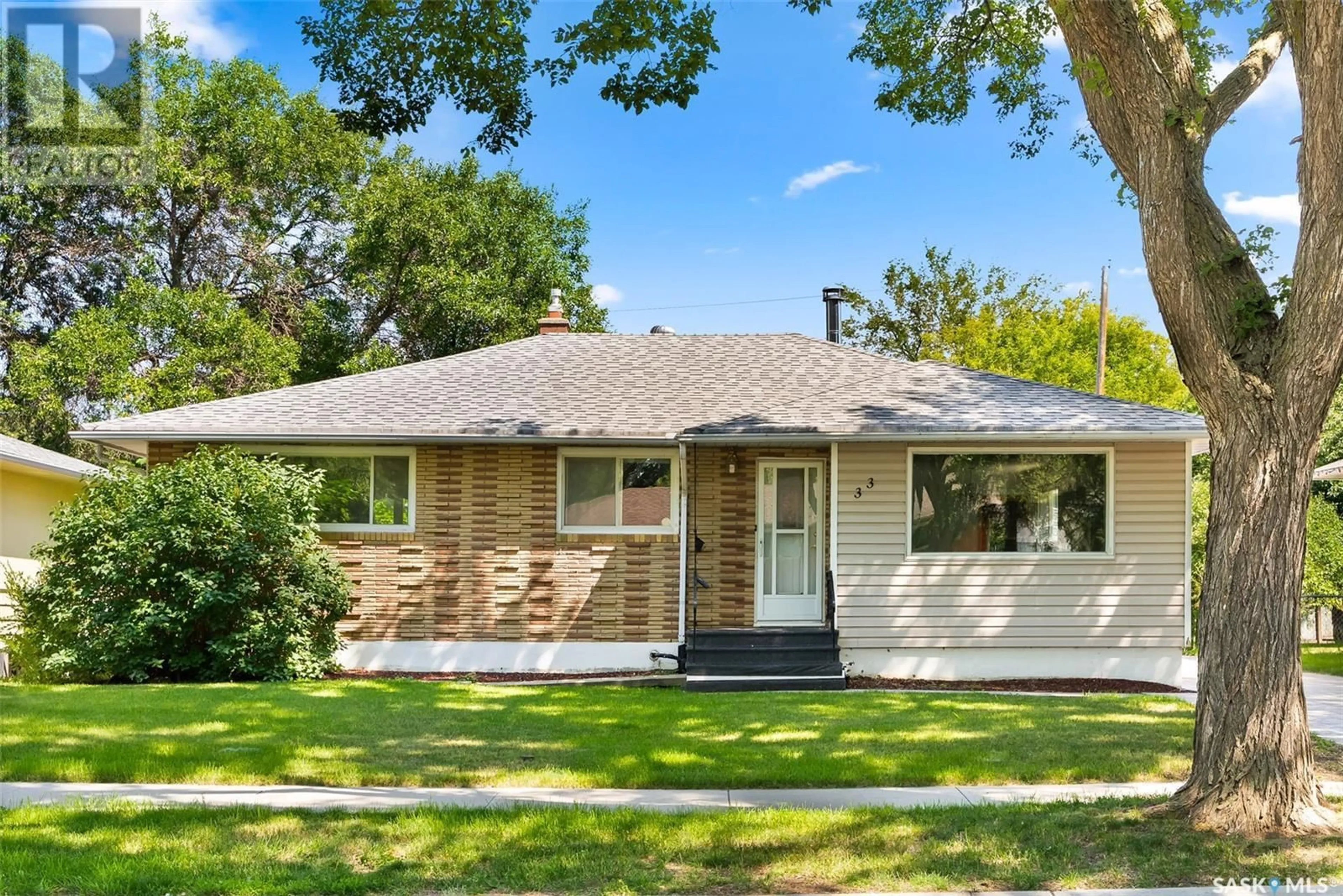 Home with vinyl exterior material, street for 33 LAKE STREET, Regina Saskatchewan S4S4A7