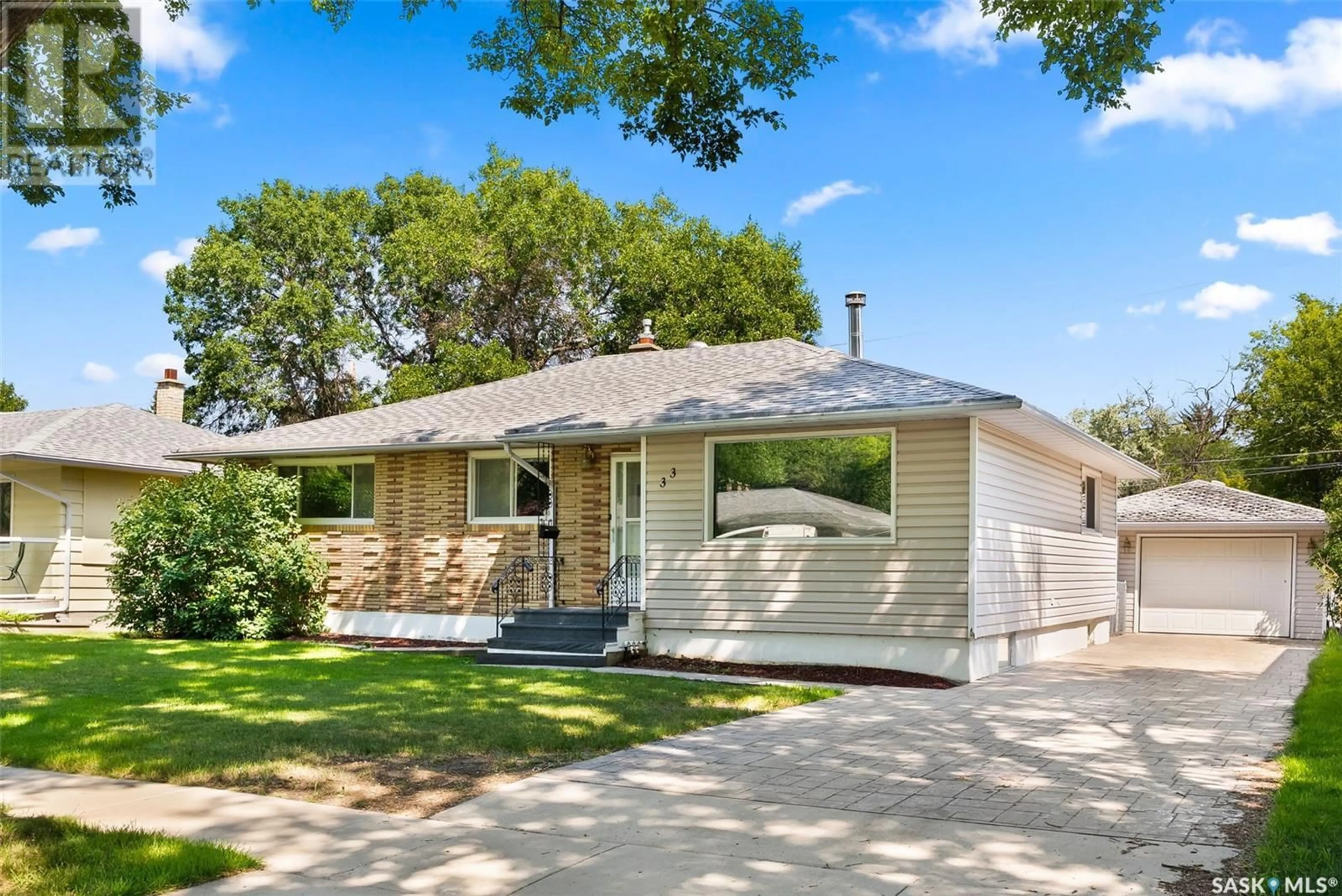 Home with vinyl exterior material, street for 33 LAKE STREET, Regina Saskatchewan S4S4A7