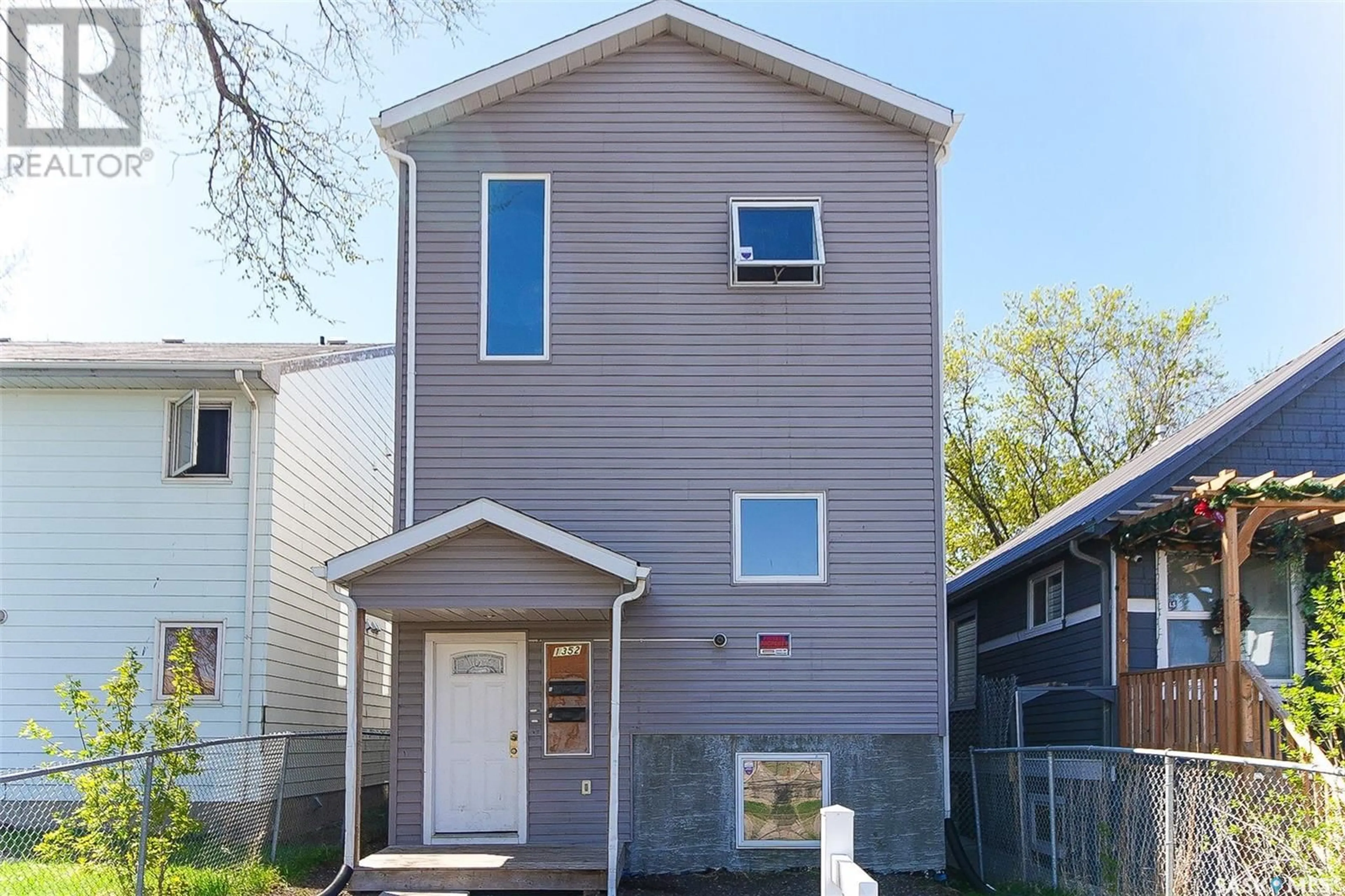 Home with vinyl exterior material, street for 1352 ANGUS STREET, Regina Saskatchewan S4T1Y8