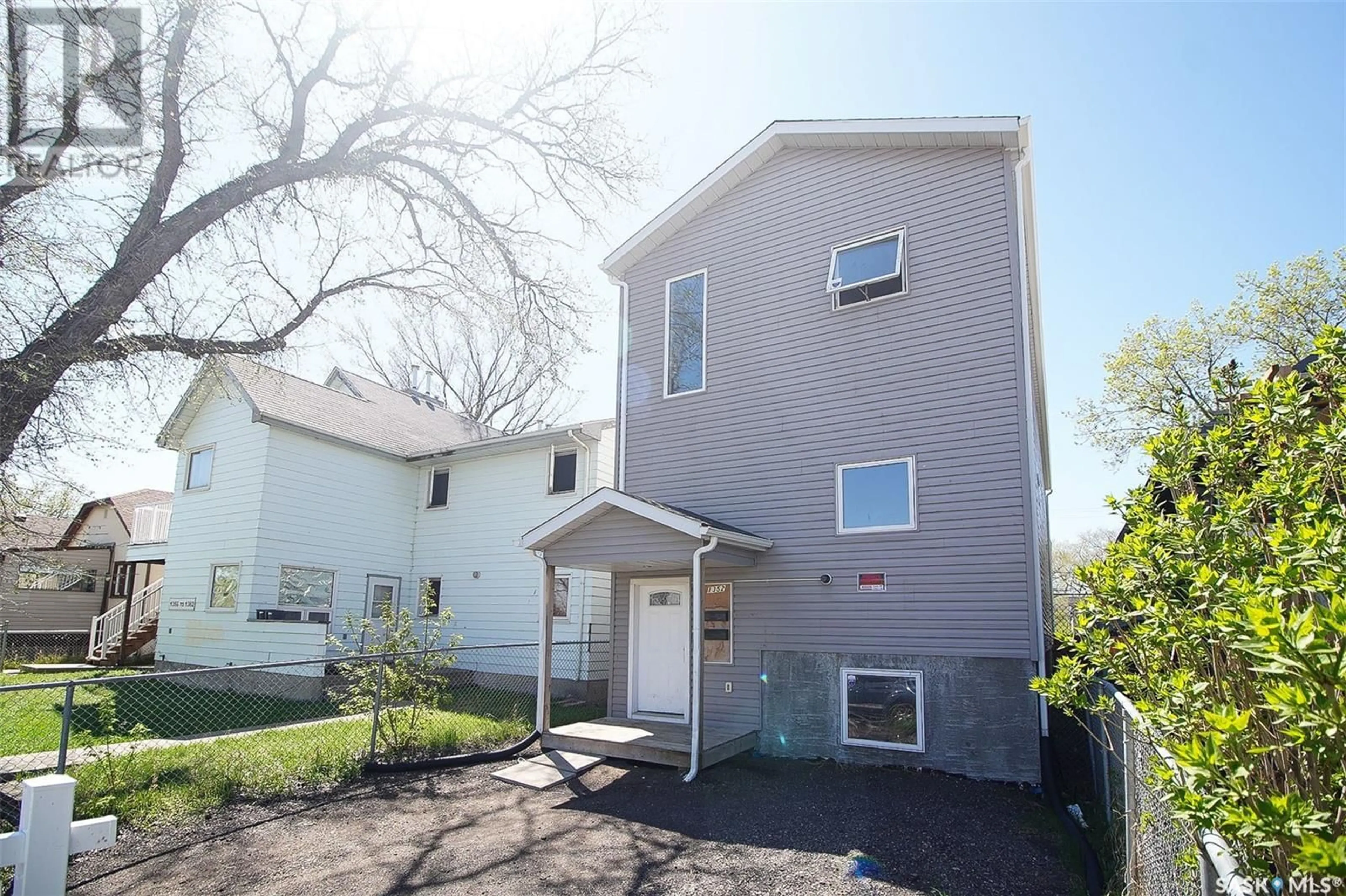 Home with vinyl exterior material, street for 1352 ANGUS STREET, Regina Saskatchewan S4T1Y8