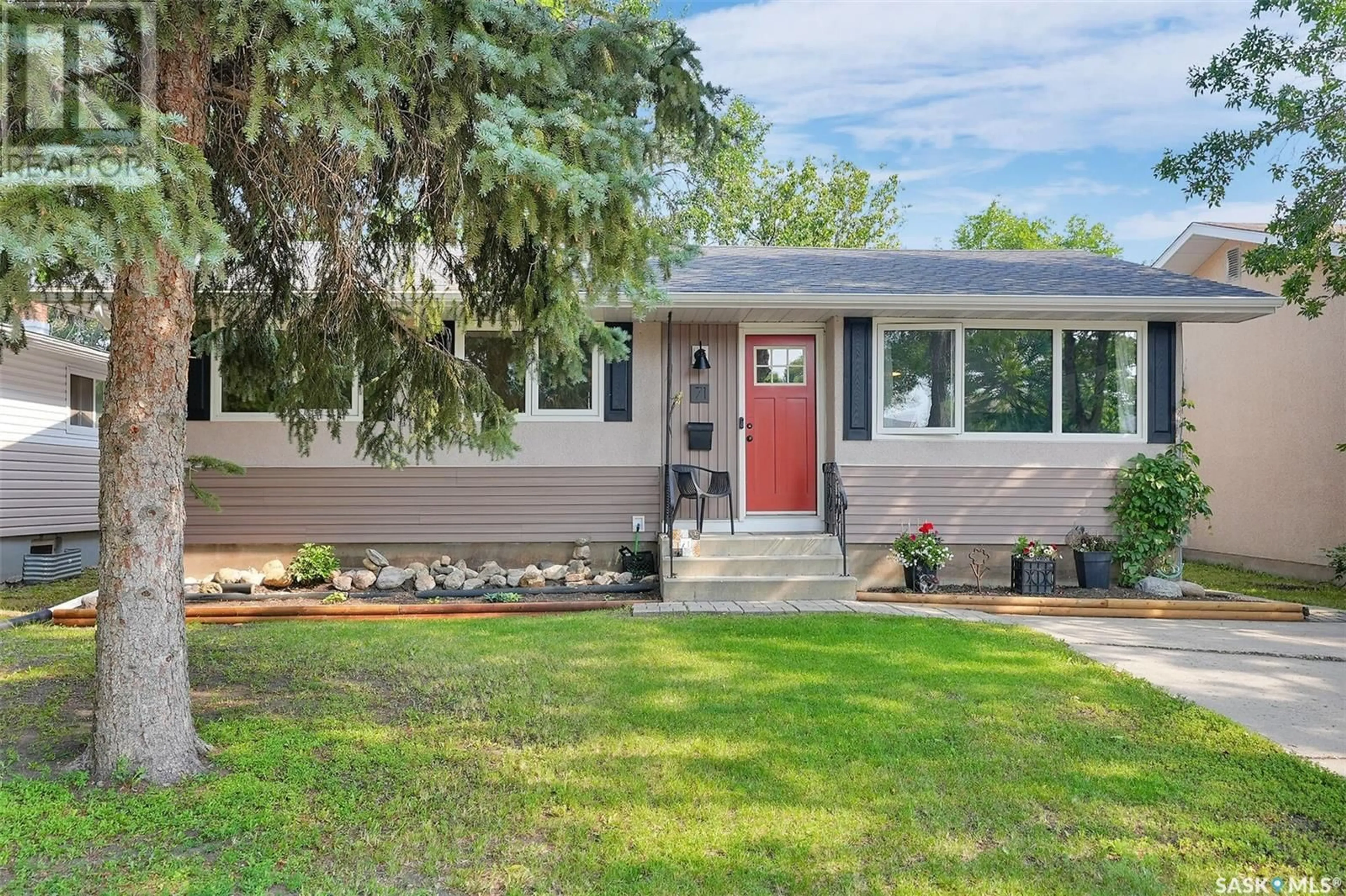 Home with vinyl exterior material, street for 71 BEDFORD CRESCENT, Regina Saskatchewan S4N1M9
