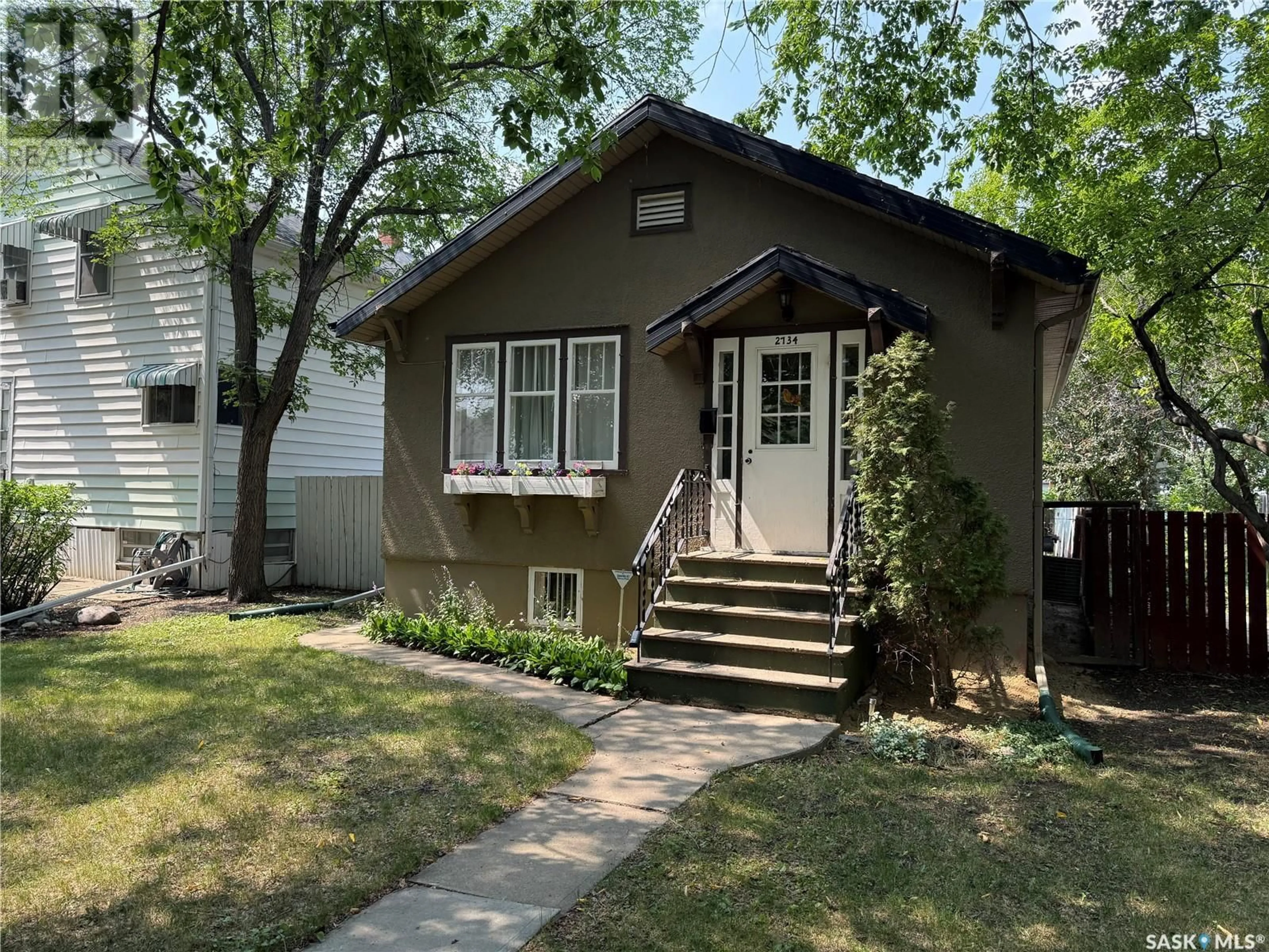 Home with vinyl exterior material, street for 2734 WALLACE STREET, Regina Saskatchewan S4N4B2