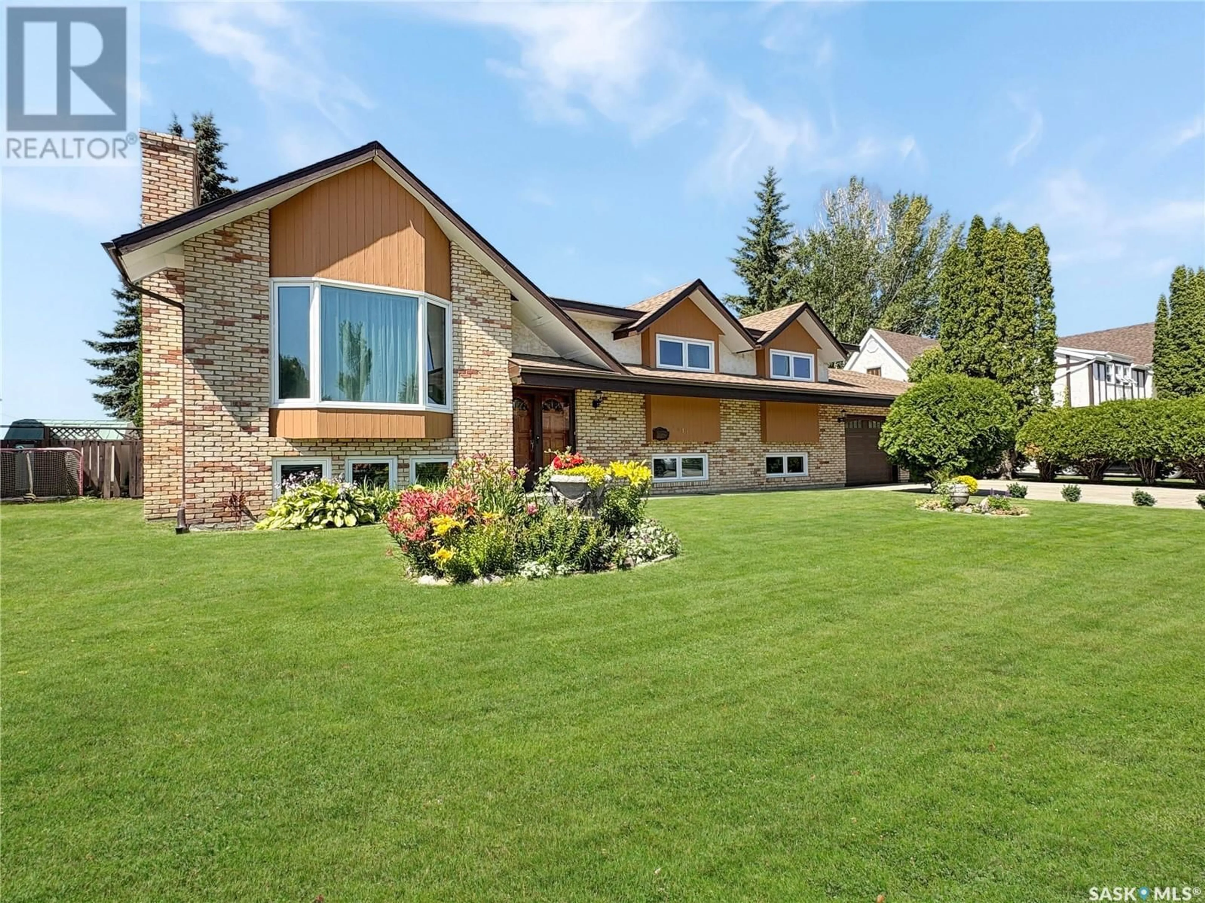 Home with brick exterior material, unknown for 2411 MEADOW LARK LANE, North Battleford Saskatchewan S9A3V1