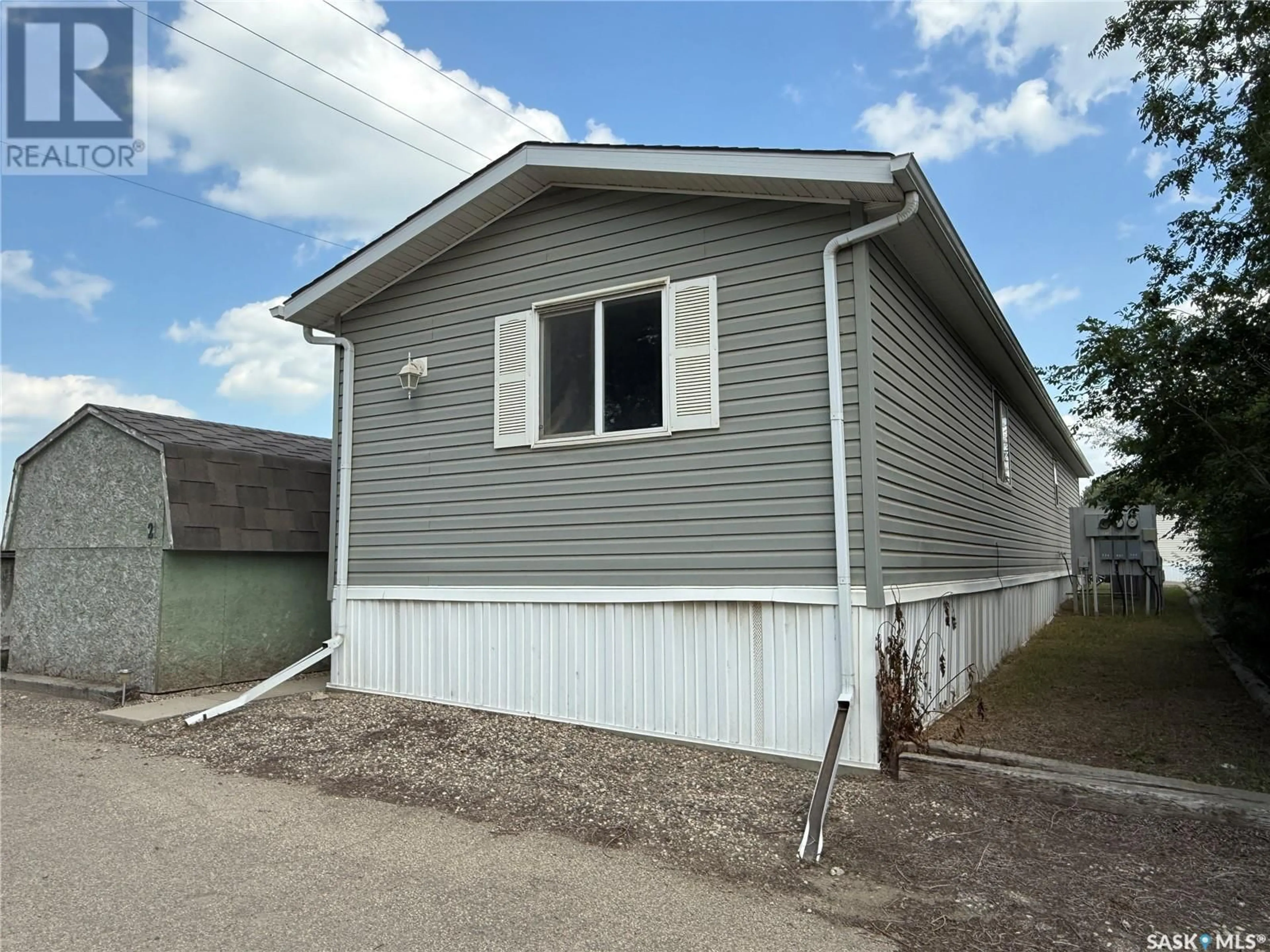 Home with vinyl exterior material, building for 21 B AVENUE, Moose Jaw Saskatchewan S6H1P3
