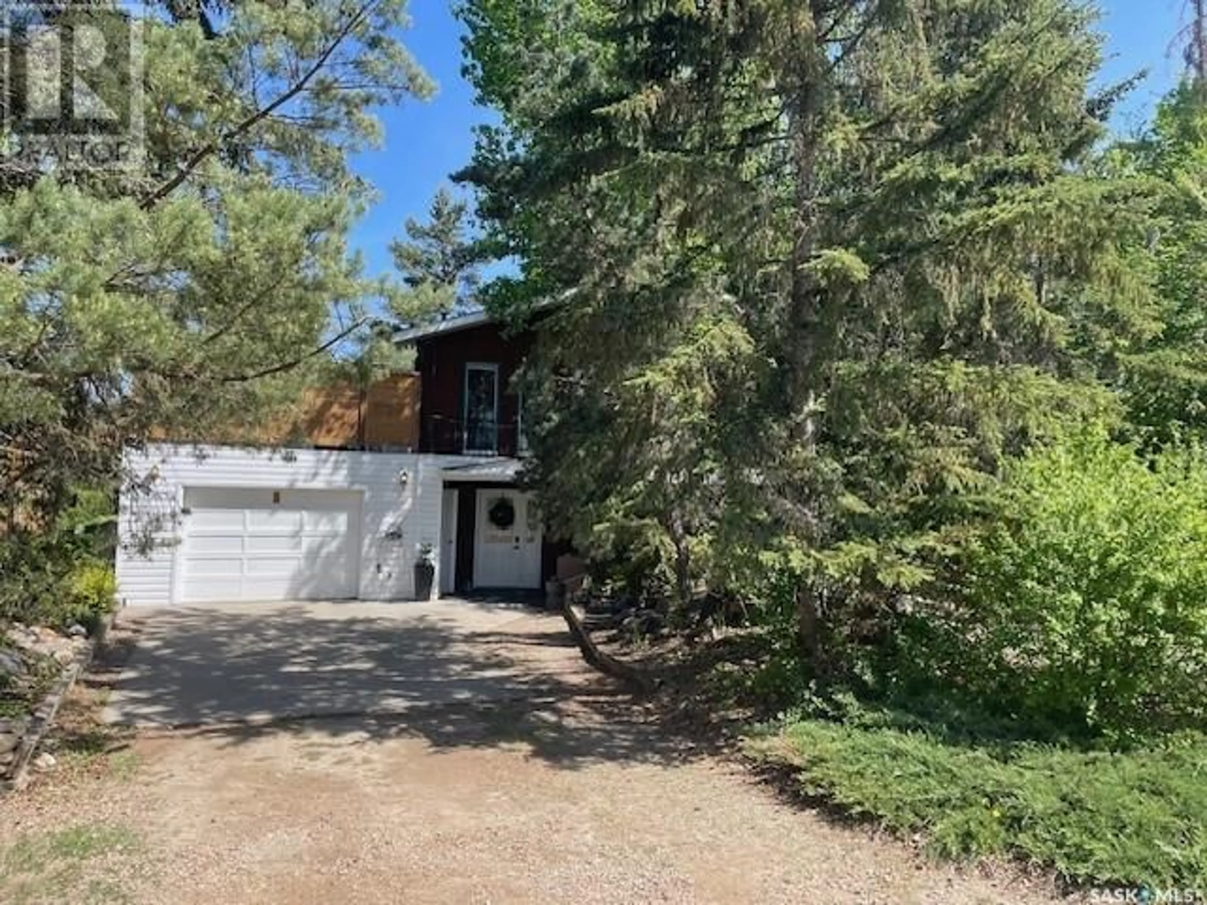 A pic from outside/outdoor area/front of a property/back of a property/a pic from drone, unknown for 8008 7TH STREET, Rosthern Saskatchewan S0K3R0
