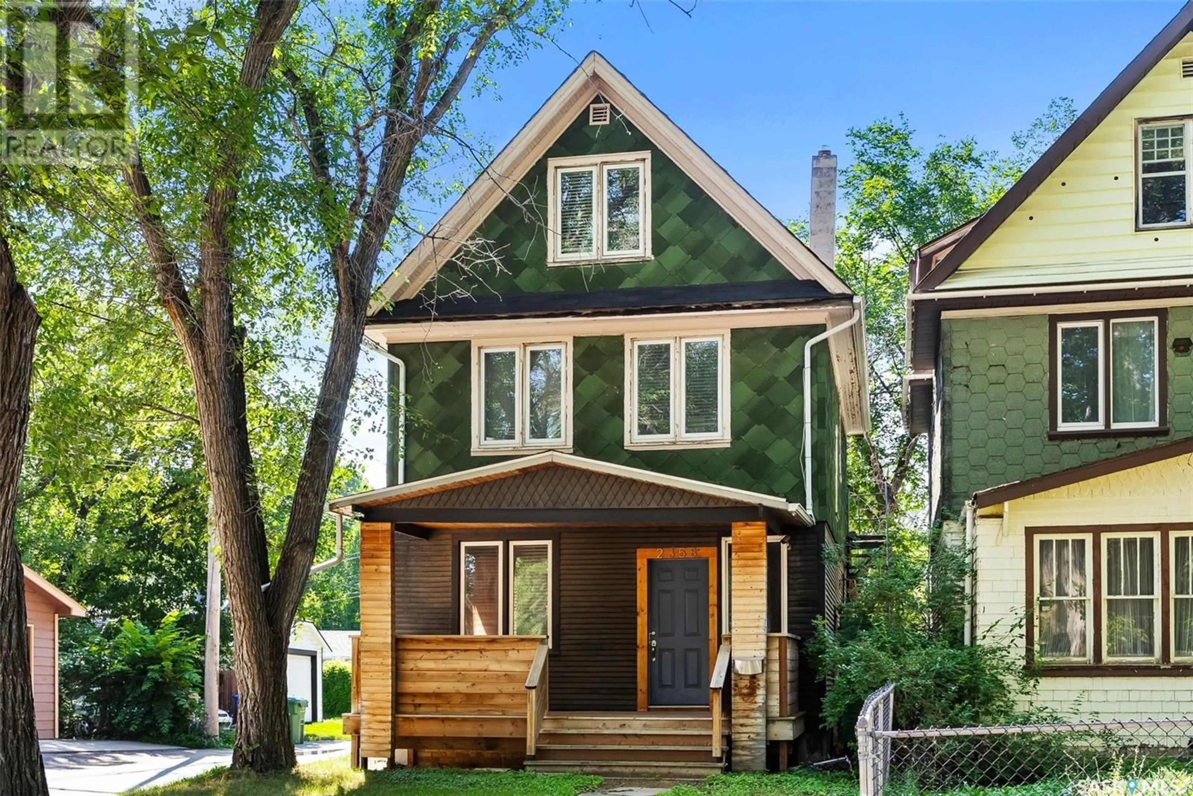 Home with vinyl exterior material, street for 2358 MONTREAL STREET, Regina Saskatchewan S4P1L8
