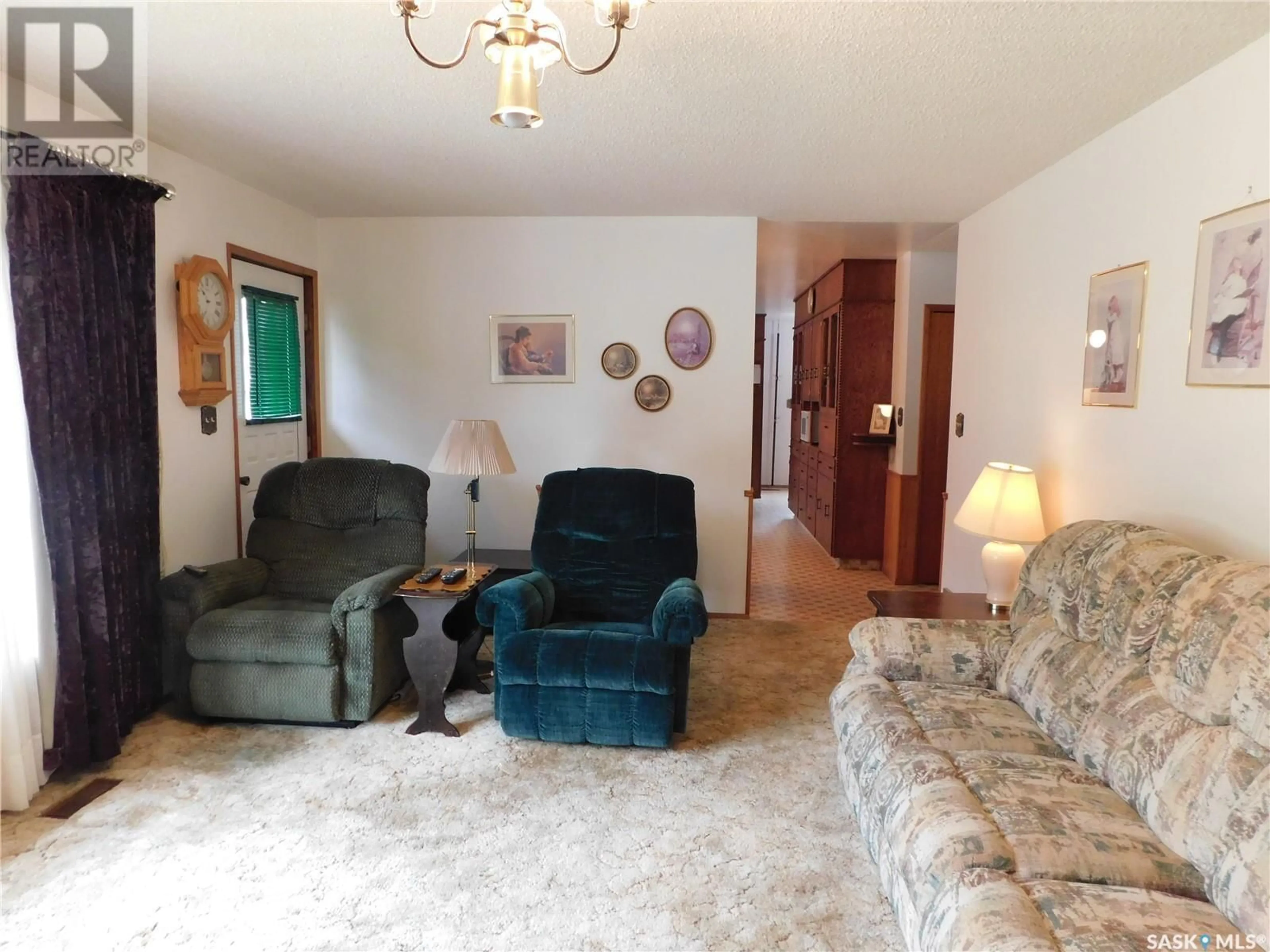 Living room with furniture, unknown for 217 5TH AVENUE, Assiniboia Saskatchewan S0H0B0