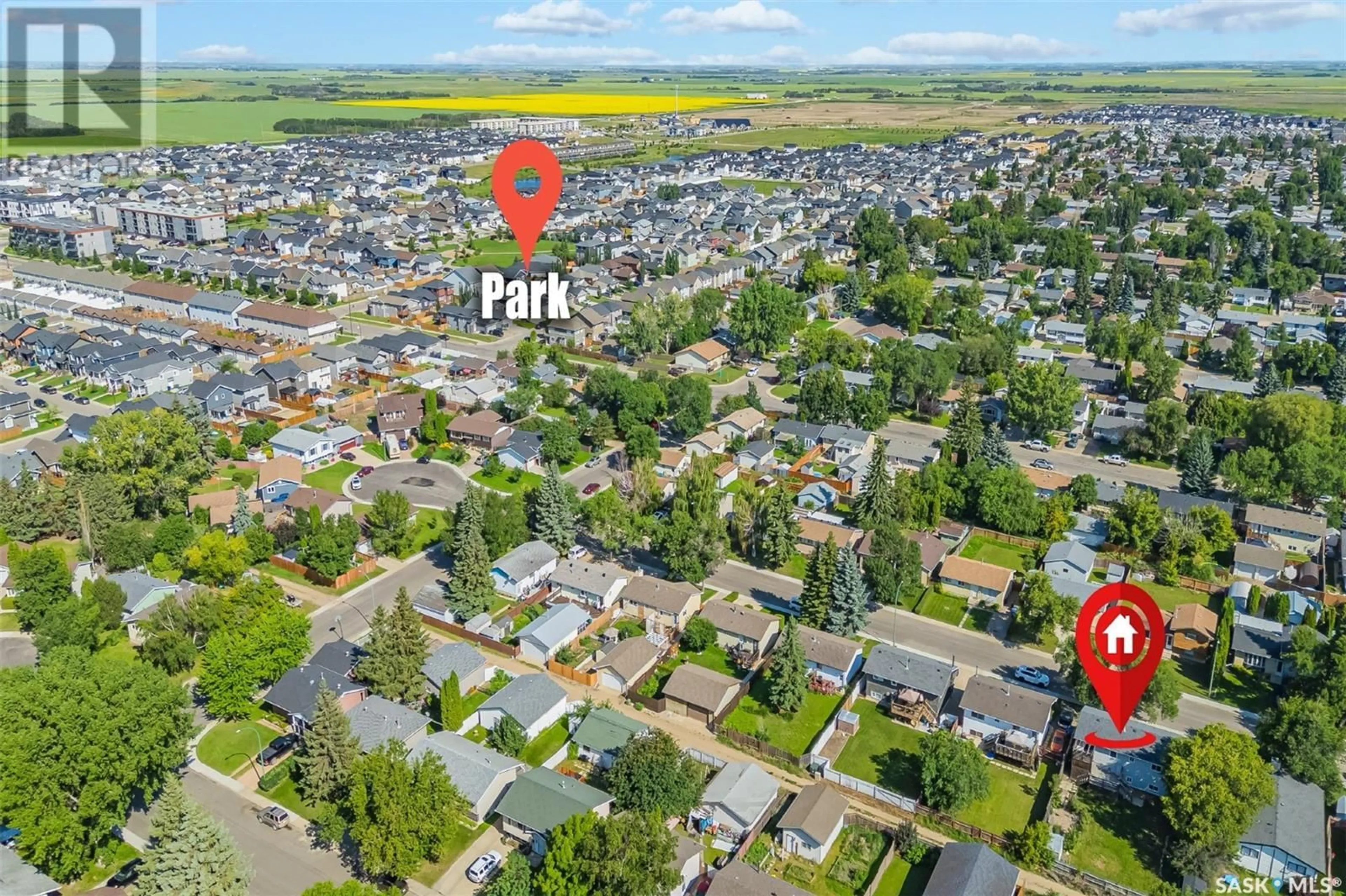 A pic from outside/outdoor area/front of a property/back of a property/a pic from drone, street for 511 MICHENER WAY, Saskatoon Saskatchewan S7L5V3