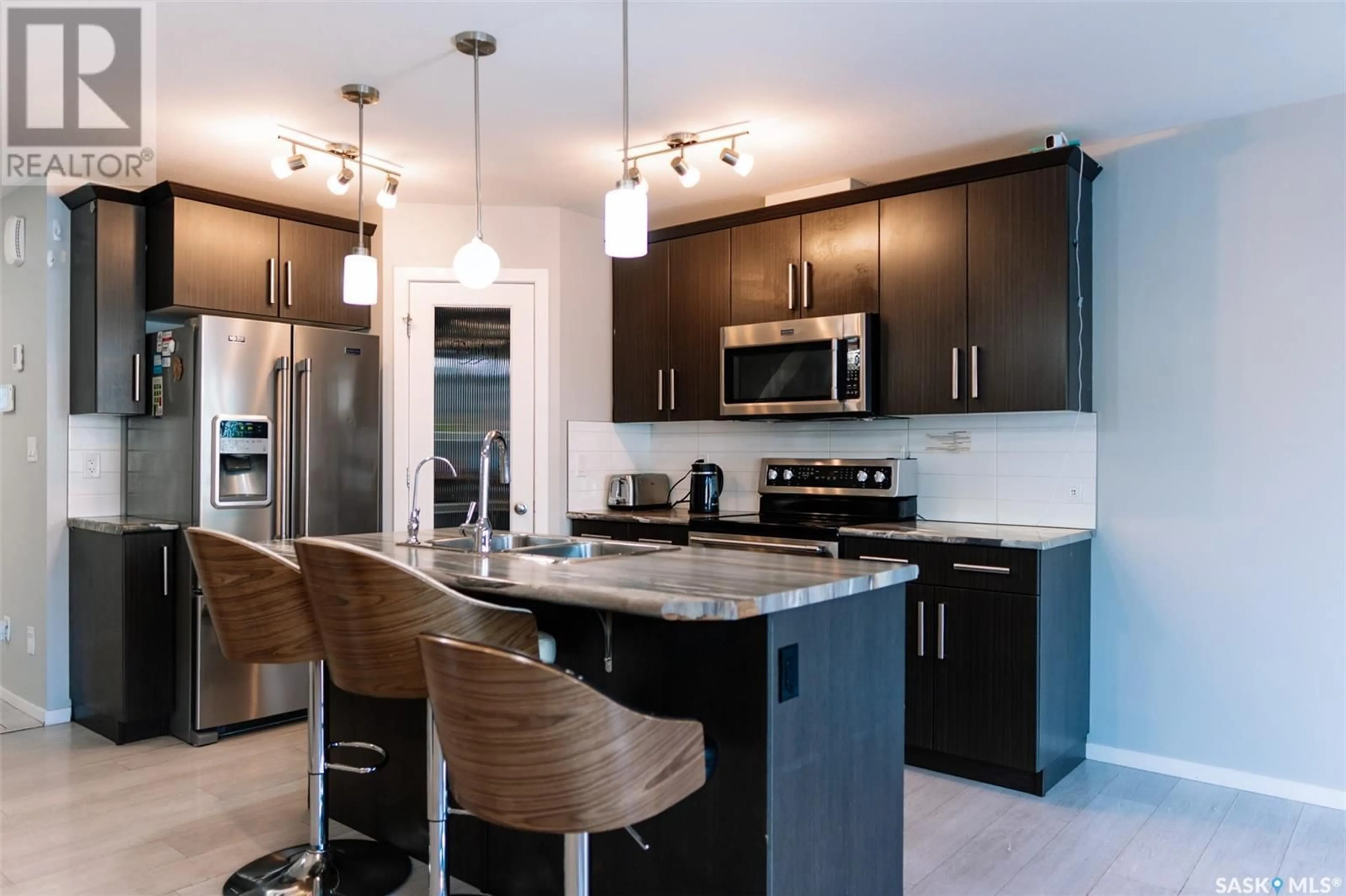Contemporary kitchen, ceramic/tile floor for 3307 GREEN SANDCHERRY STREET, Regina Saskatchewan S4V3M2