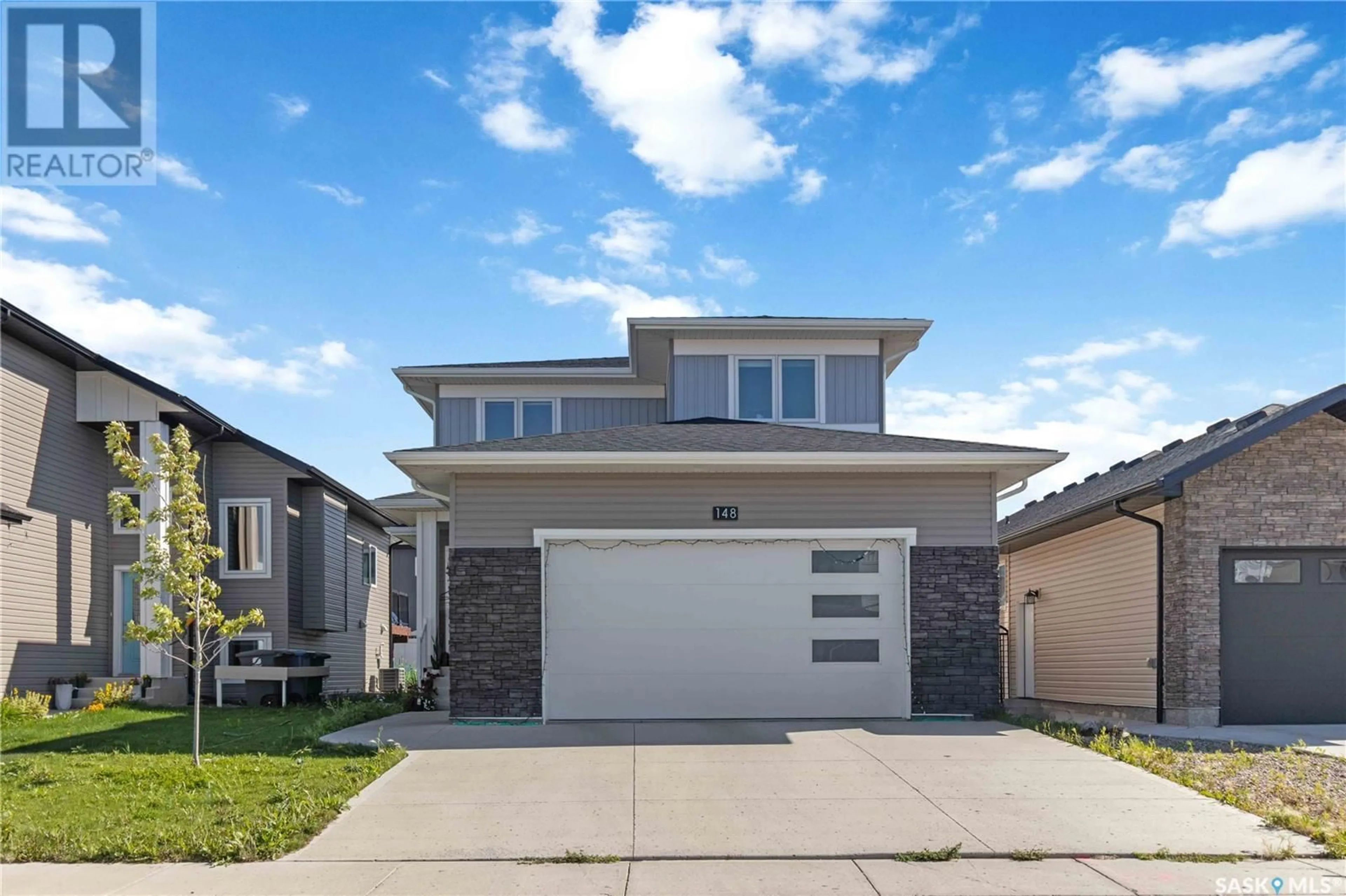 Home with brick exterior material, street for 148 BARRETT STREET, Saskatoon Saskatchewan S7W0Z7