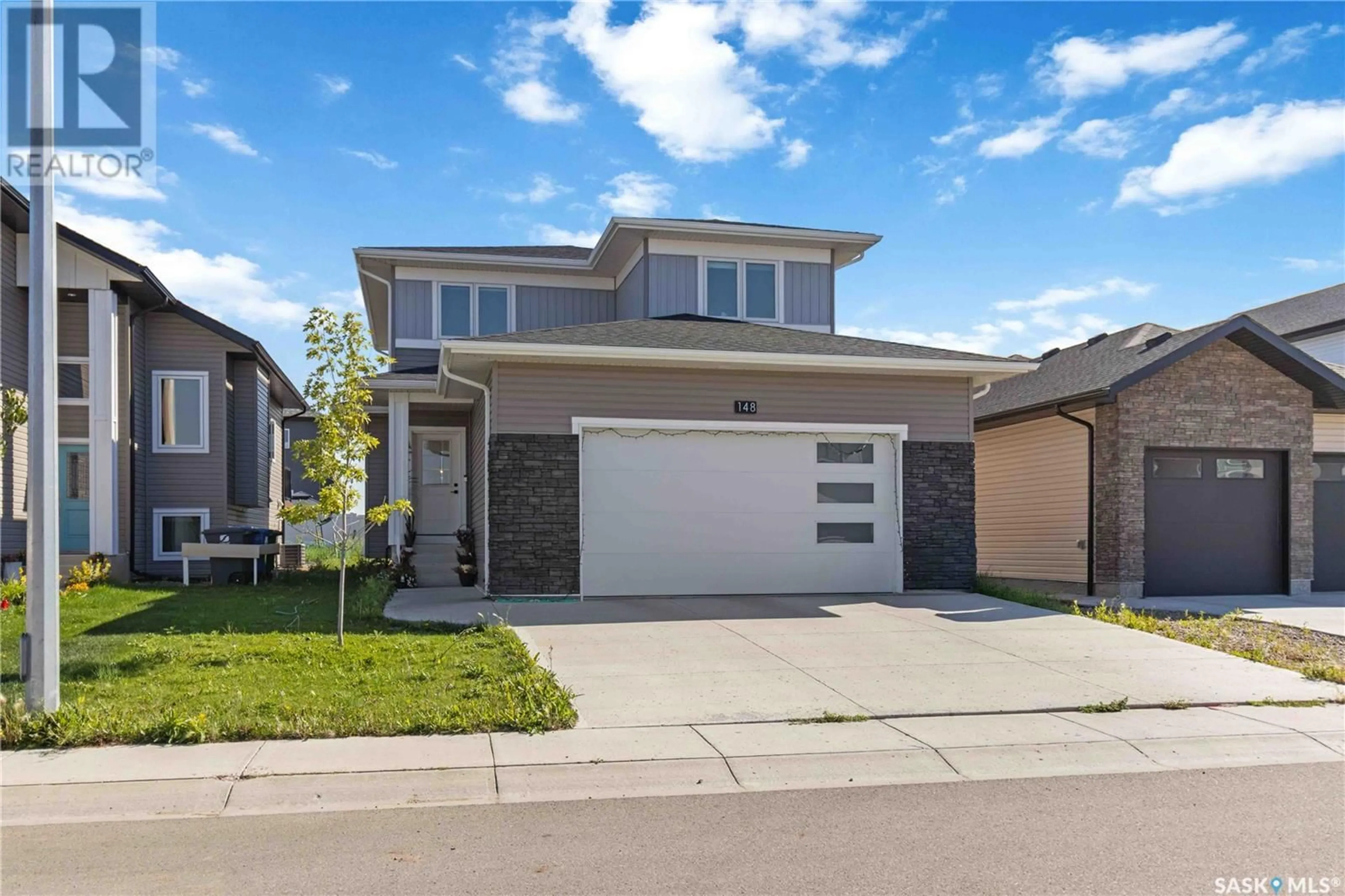 Home with brick exterior material, street for 148 BARRETT STREET, Saskatoon Saskatchewan S7W0Z7