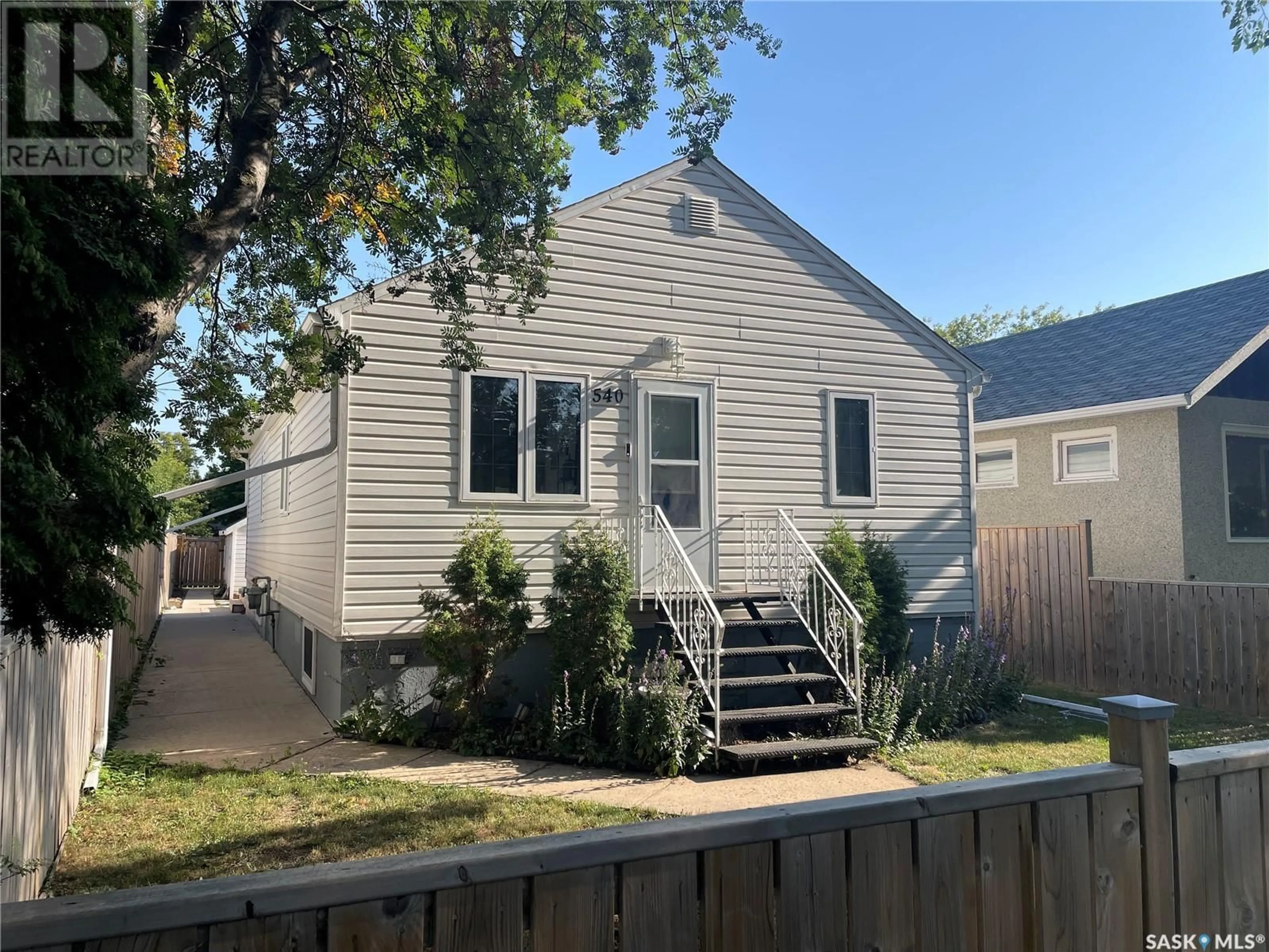 Home with vinyl exterior material, street for 540 10TH STREET, Prince Albert Saskatchewan S6V0Z6