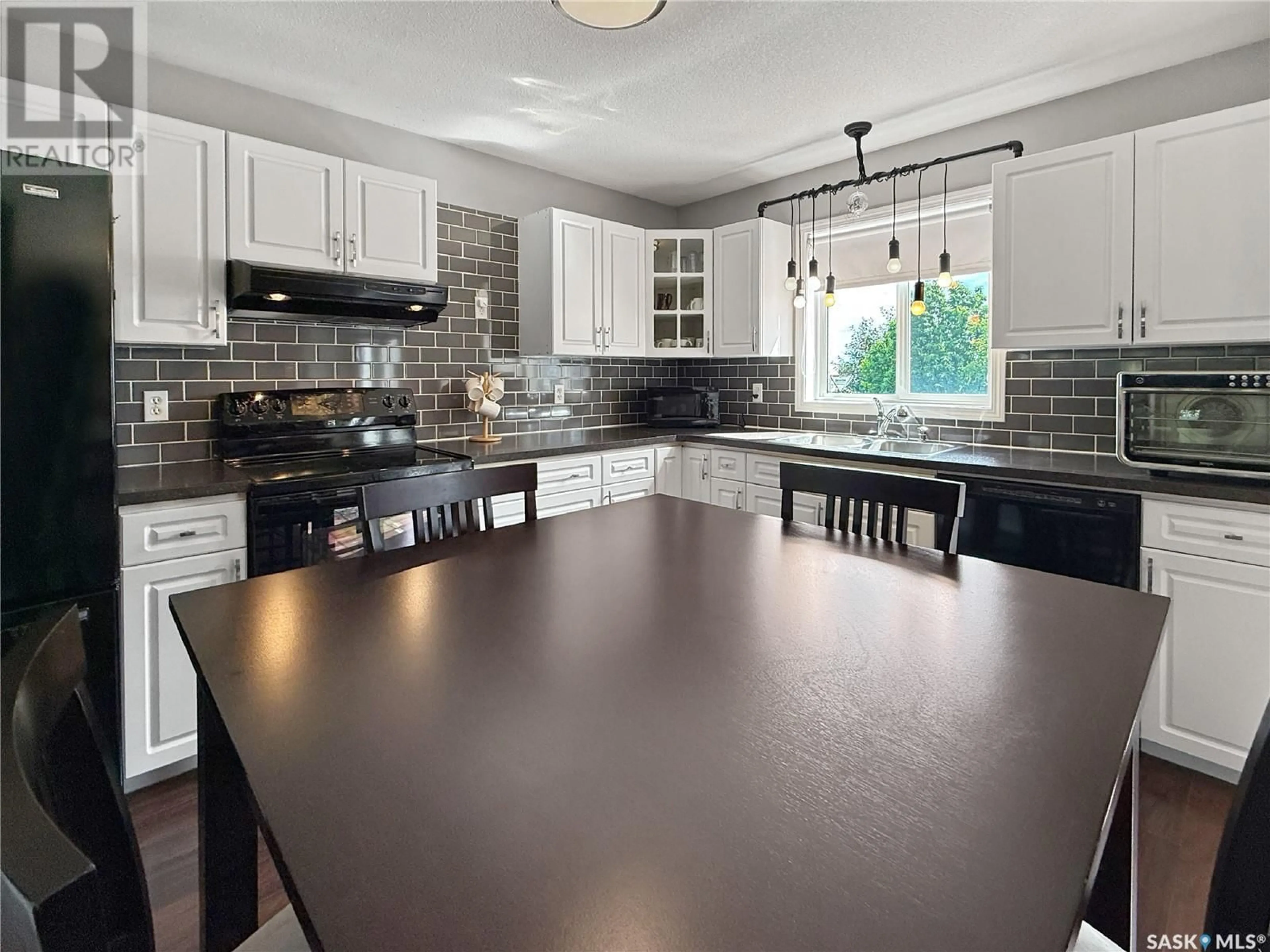 Open concept kitchen, ceramic/tile floor for 235 SOUTHWOOD DRIVE, Prince Albert Saskatchewan S6V8E7