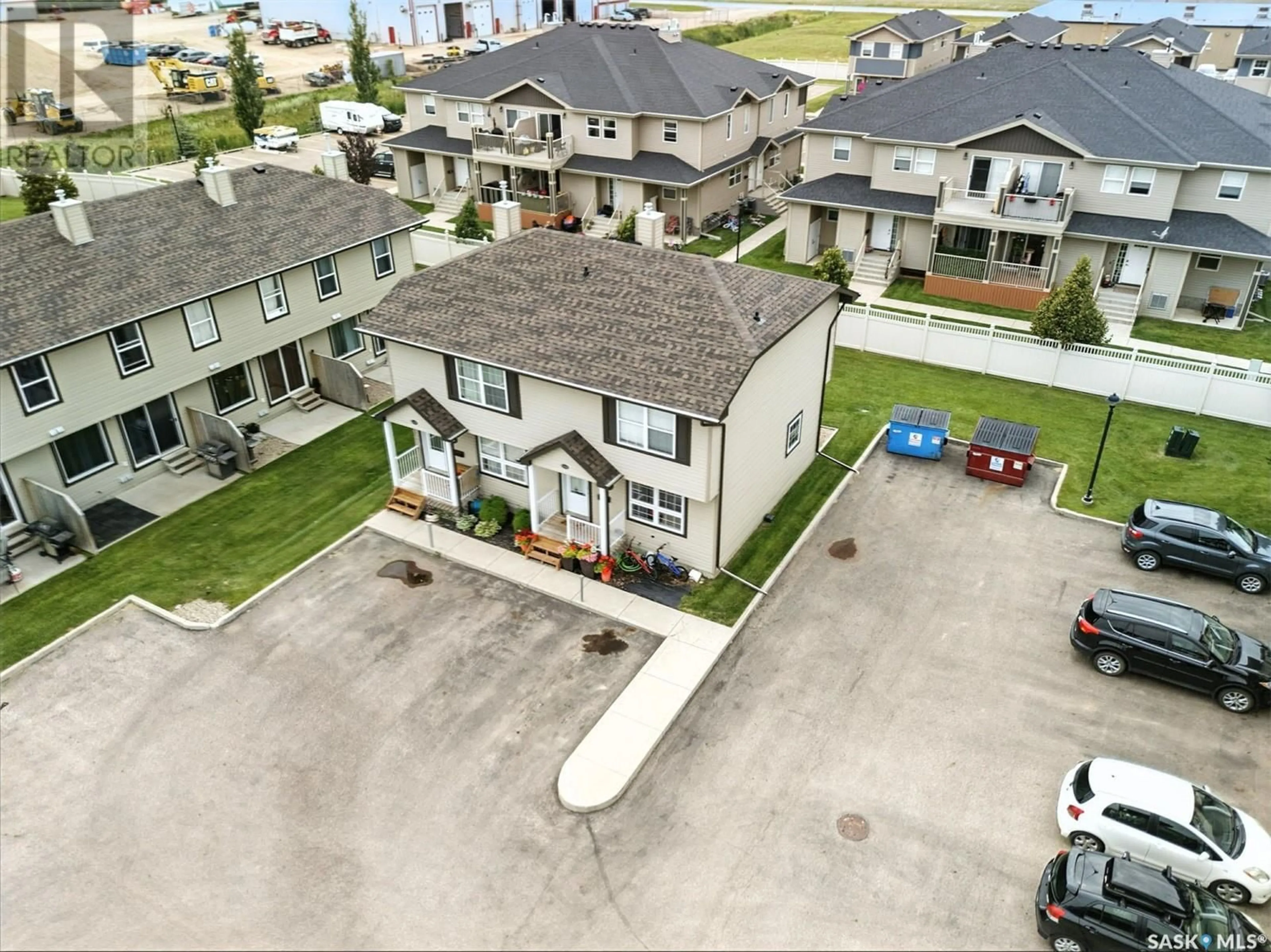 A pic from outside/outdoor area/front of a property/back of a property/a pic from drone, street for S - 141 700 2ND AVENUE, Martensville Saskatchewan S0K2T0