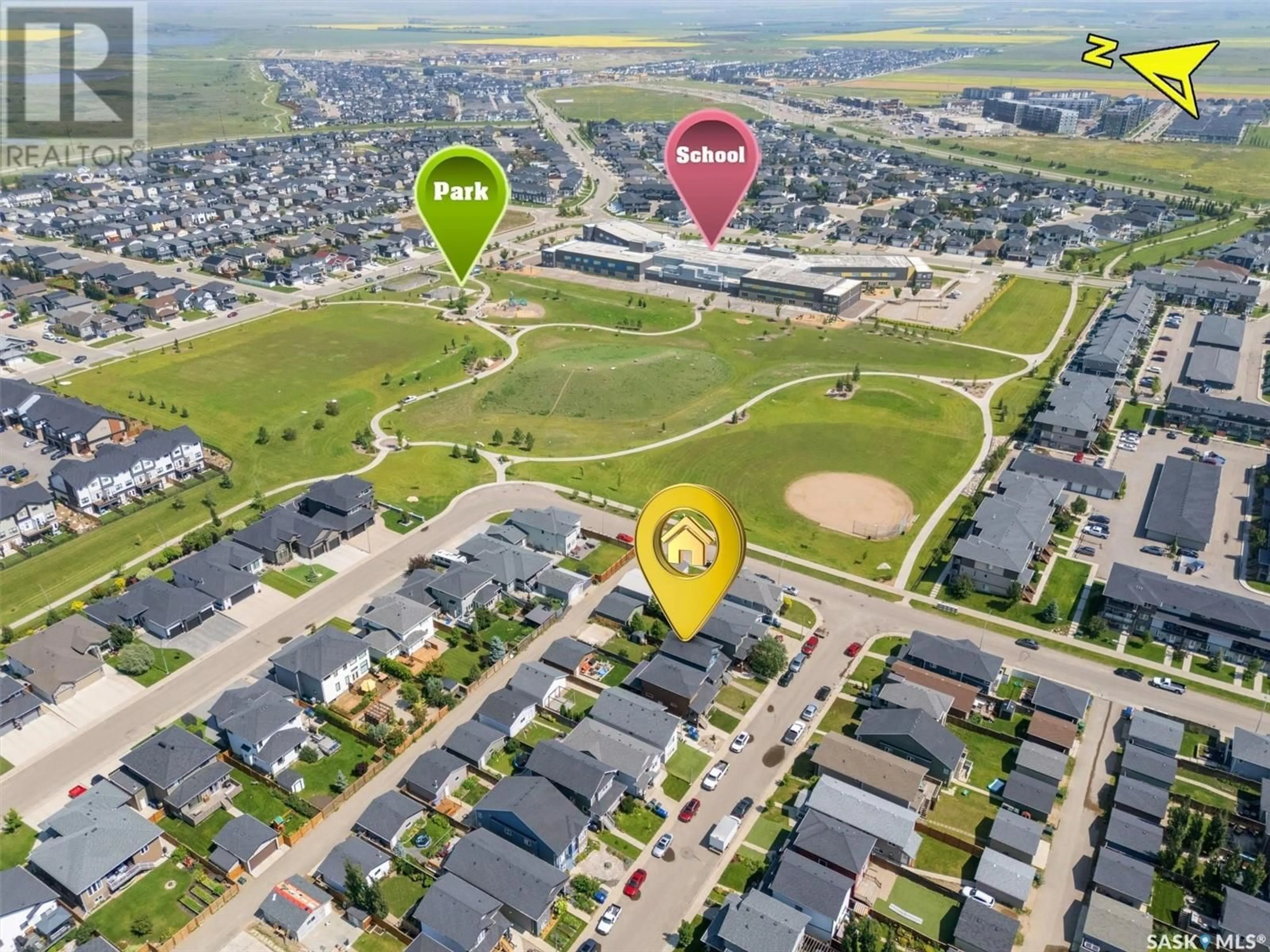 A pic from outside/outdoor area/front of a property/back of a property/a pic from drone, street for 286 WYANT LANE, Saskatoon Saskatchewan S7W0L3