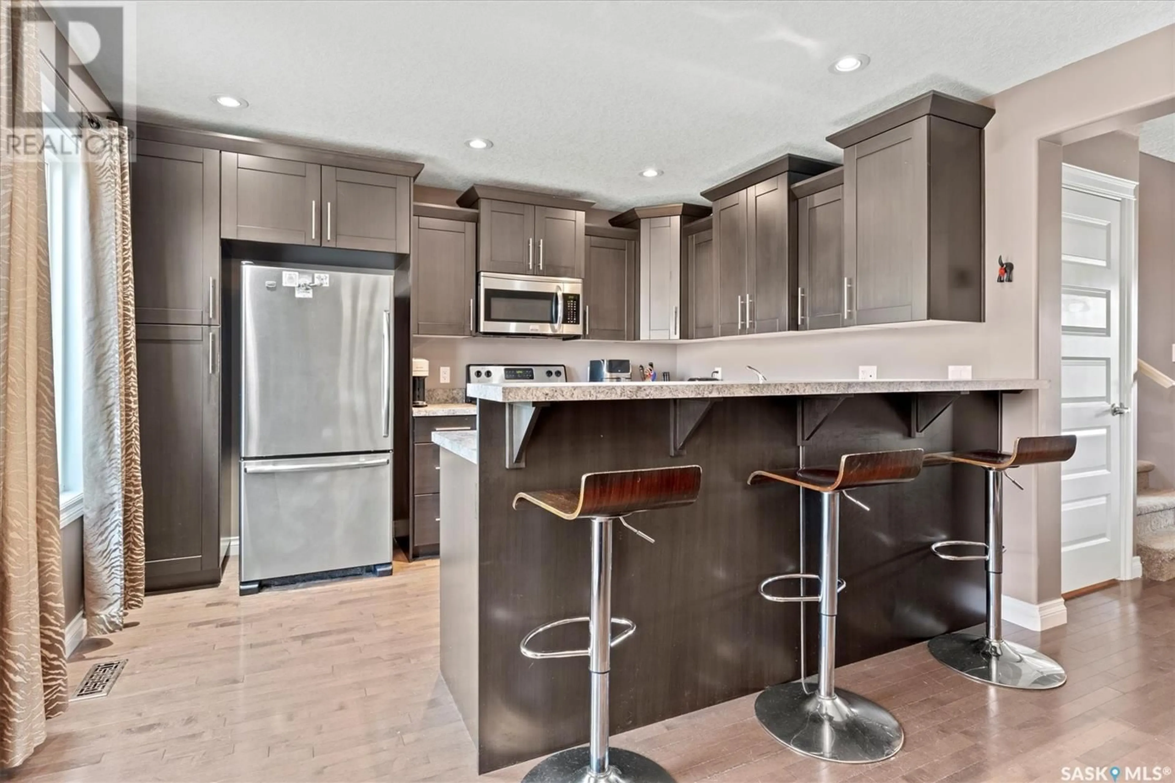 Contemporary kitchen, ceramic/tile floor for 286 WYANT LANE, Saskatoon Saskatchewan S7W0L3