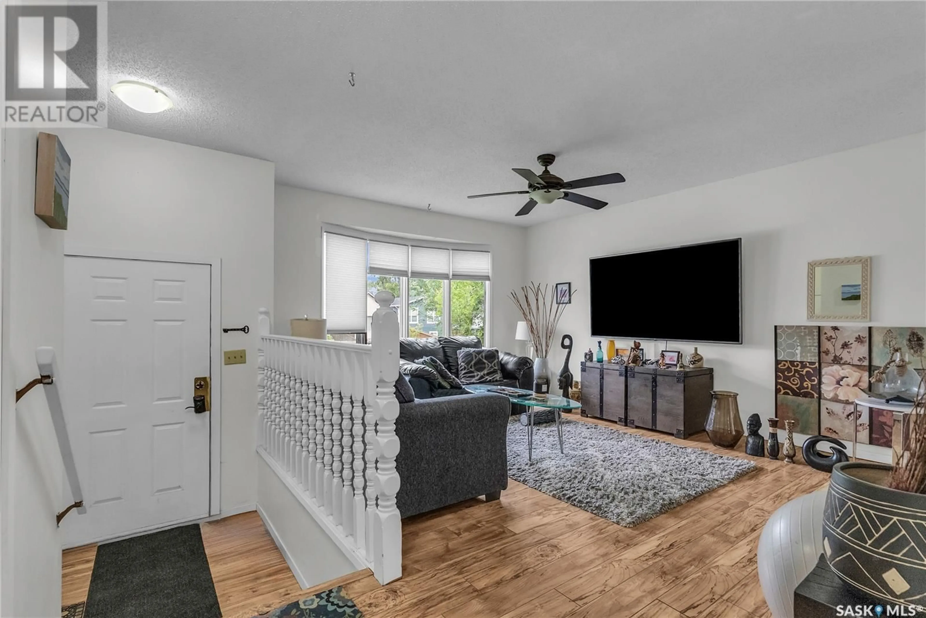 Living room with furniture, unknown for 211 L AVENUE, Saskatoon Saskatchewan S7L2P3