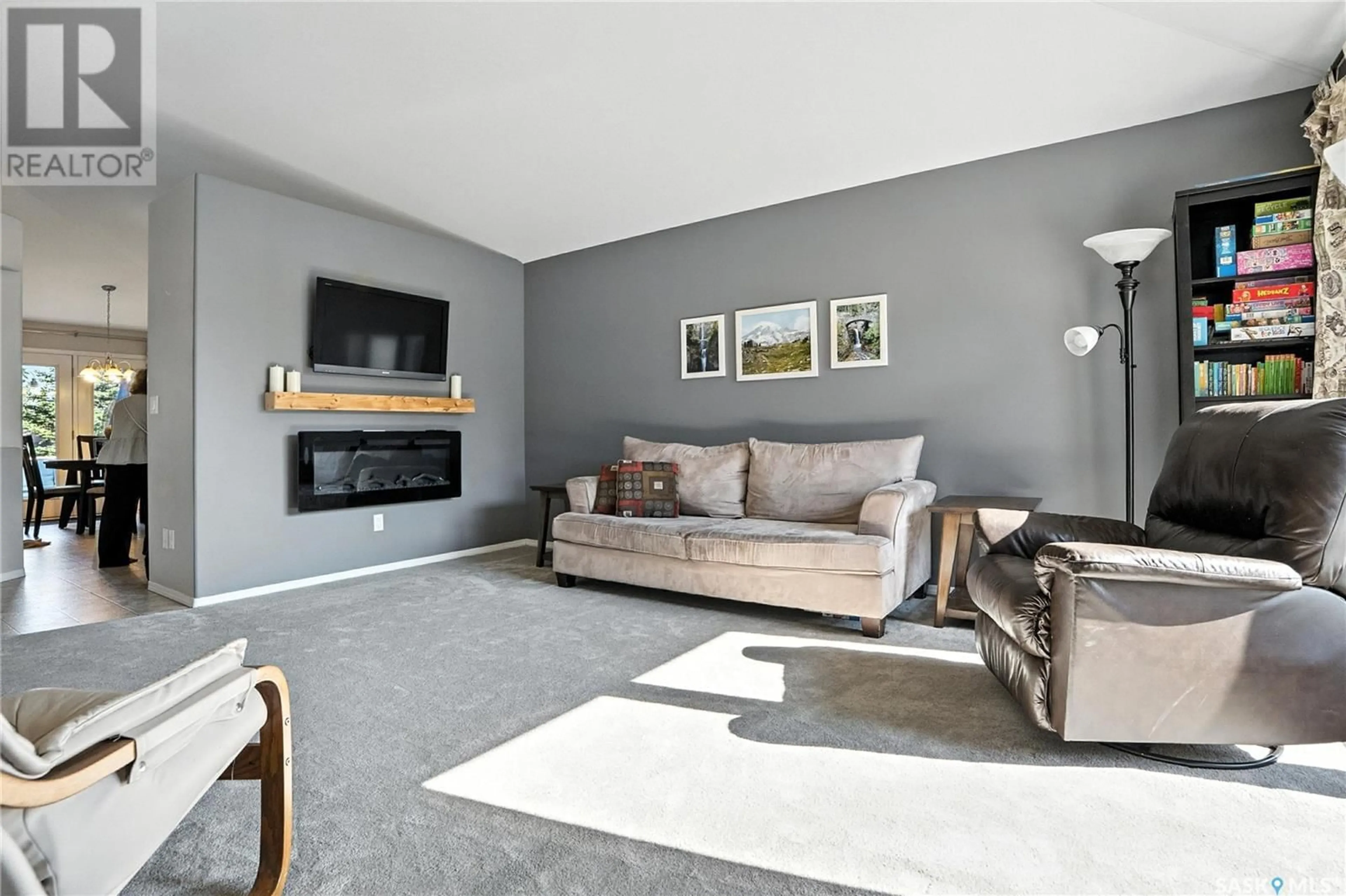 Living room with furniture, unknown for 103 DULMAGE CRESCENT, Saskatoon Saskatchewan S7T0C7