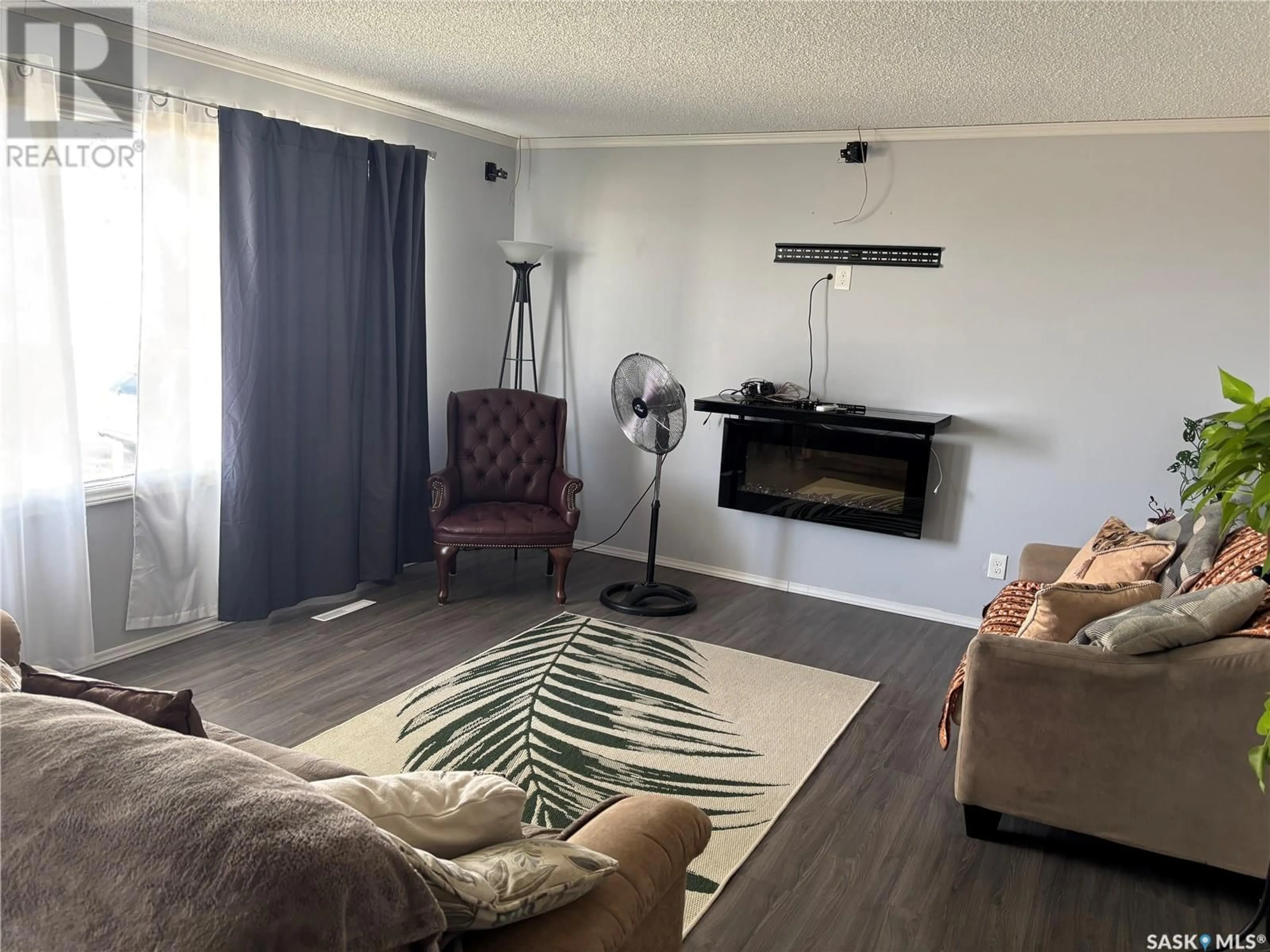 Living room with furniture, wood/laminate floor for 531 ANNABLE STREET, Herbert Saskatchewan S0H2A0