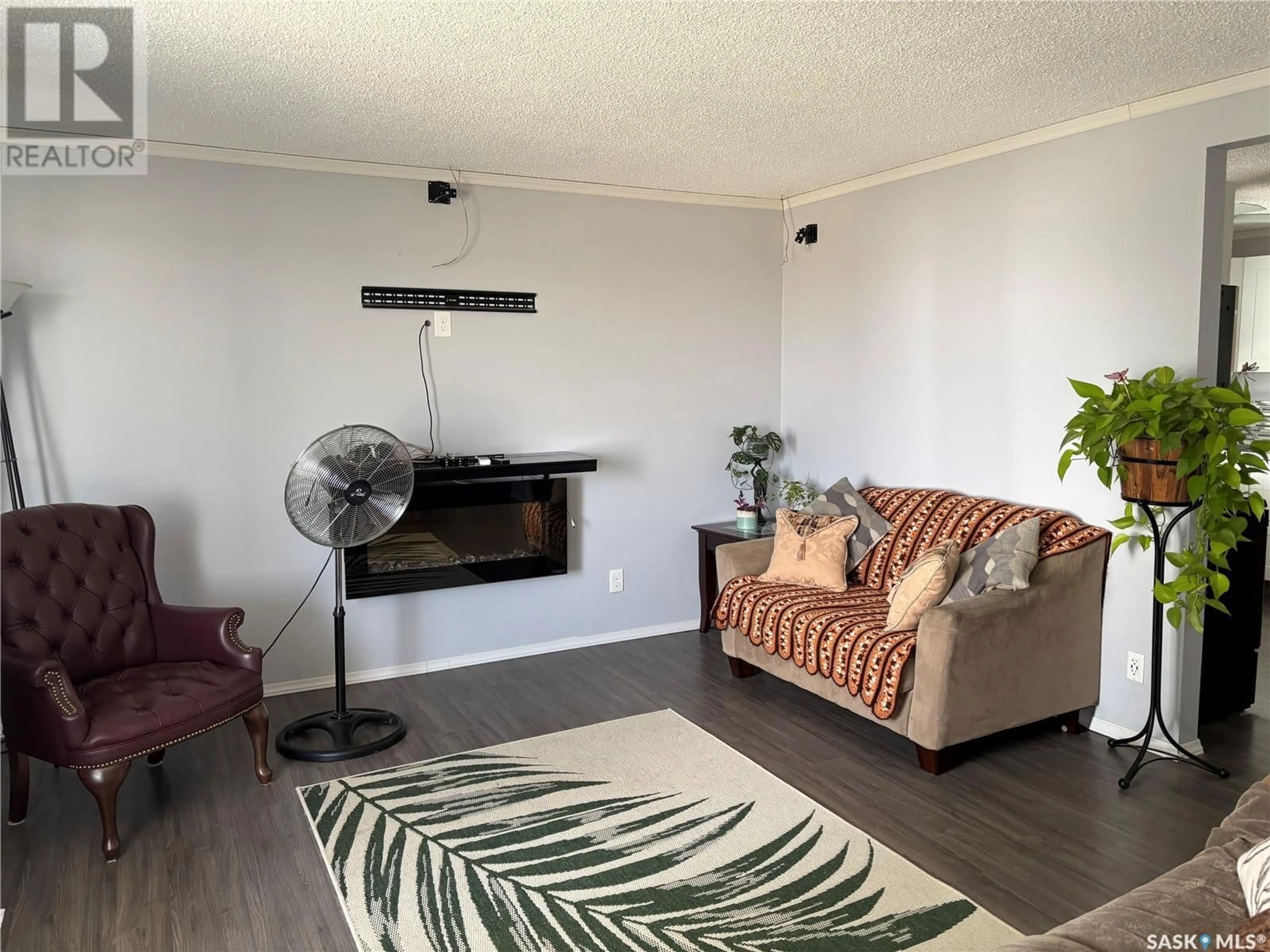 Living room with furniture, wood/laminate floor for 531 ANNABLE STREET, Herbert Saskatchewan S0H2A0