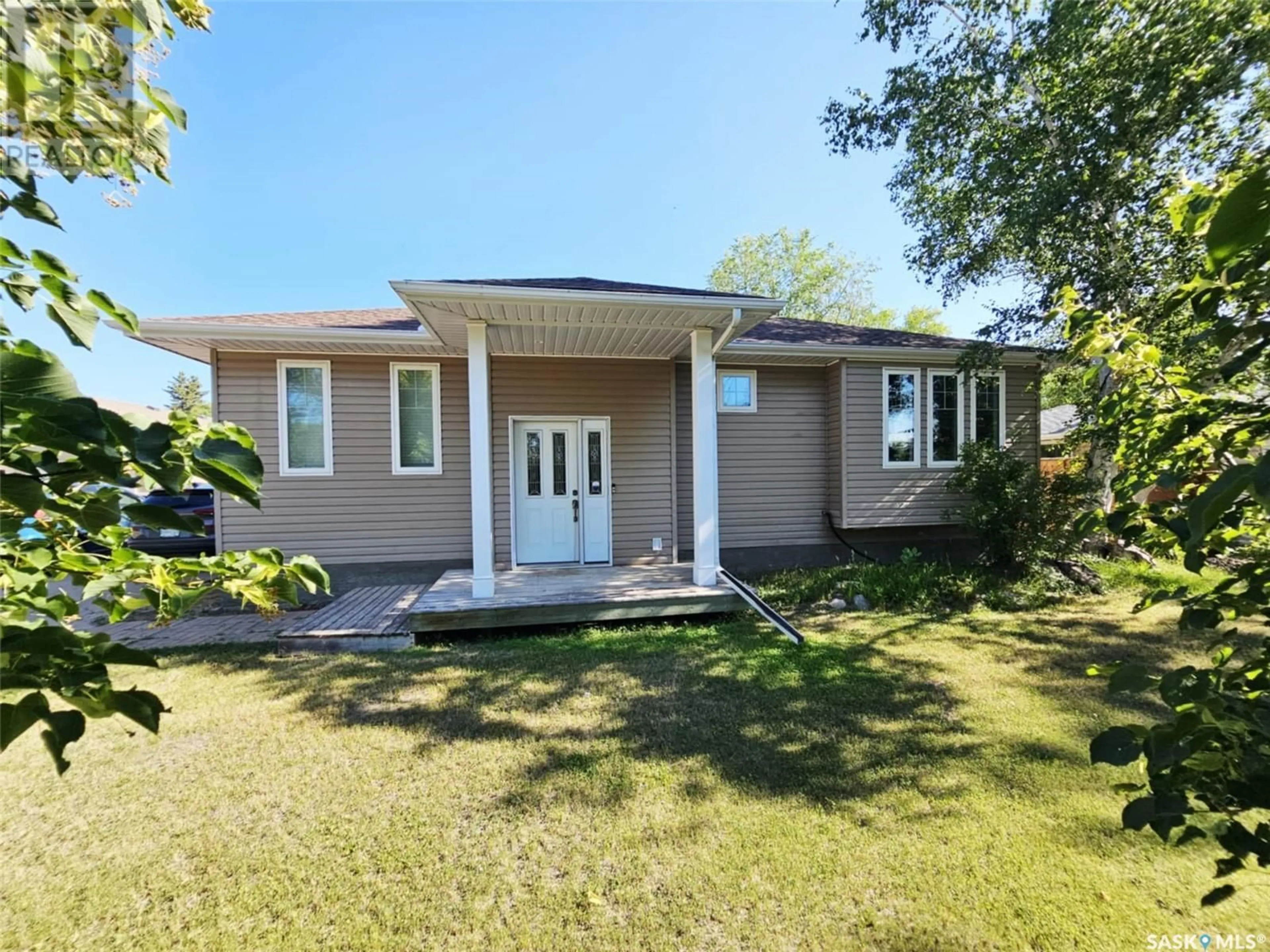 Home with vinyl exterior material, street for 1122 BORDEN DRIVE, Esterhazy Saskatchewan S0A0X0