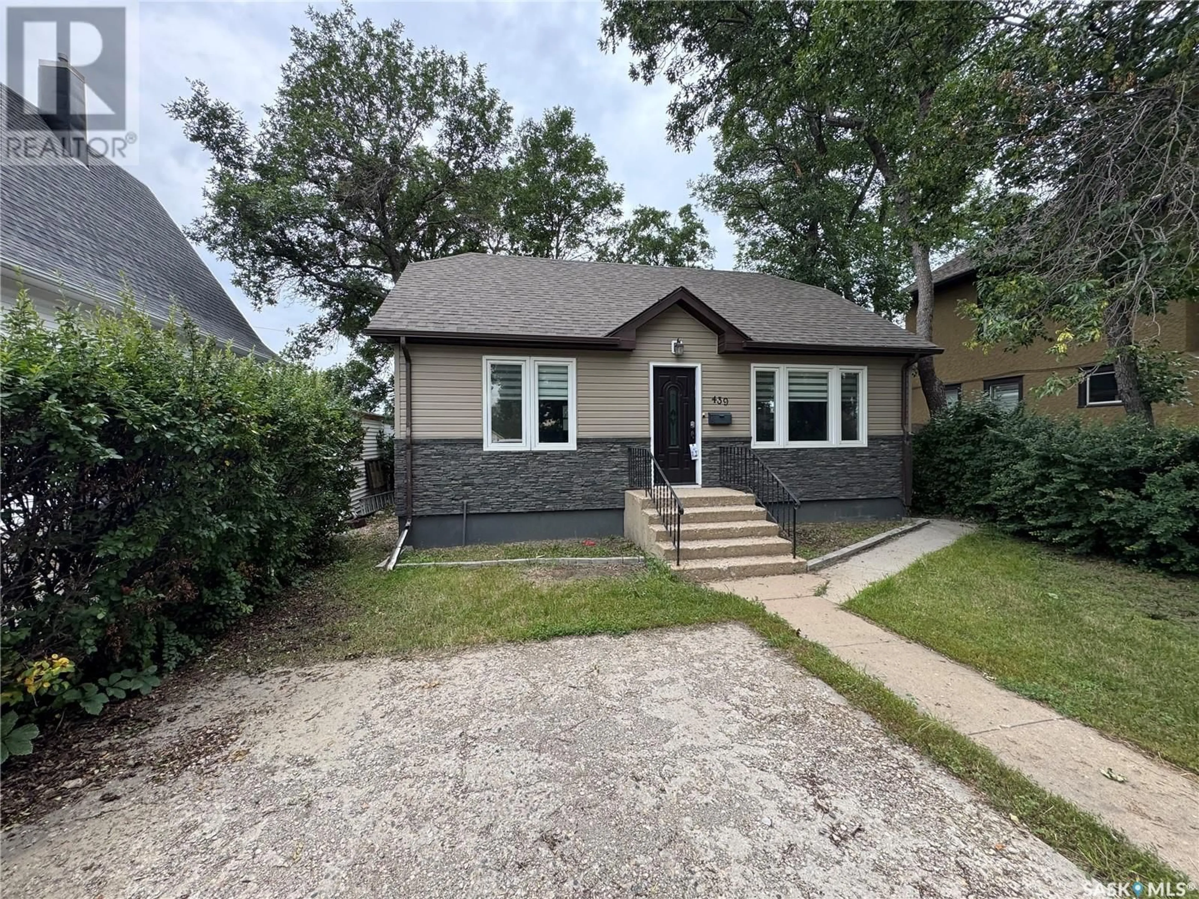 Home with brick exterior material, street for 439 QU'APPELLE STREET, Weyburn Saskatchewan S4H0R3