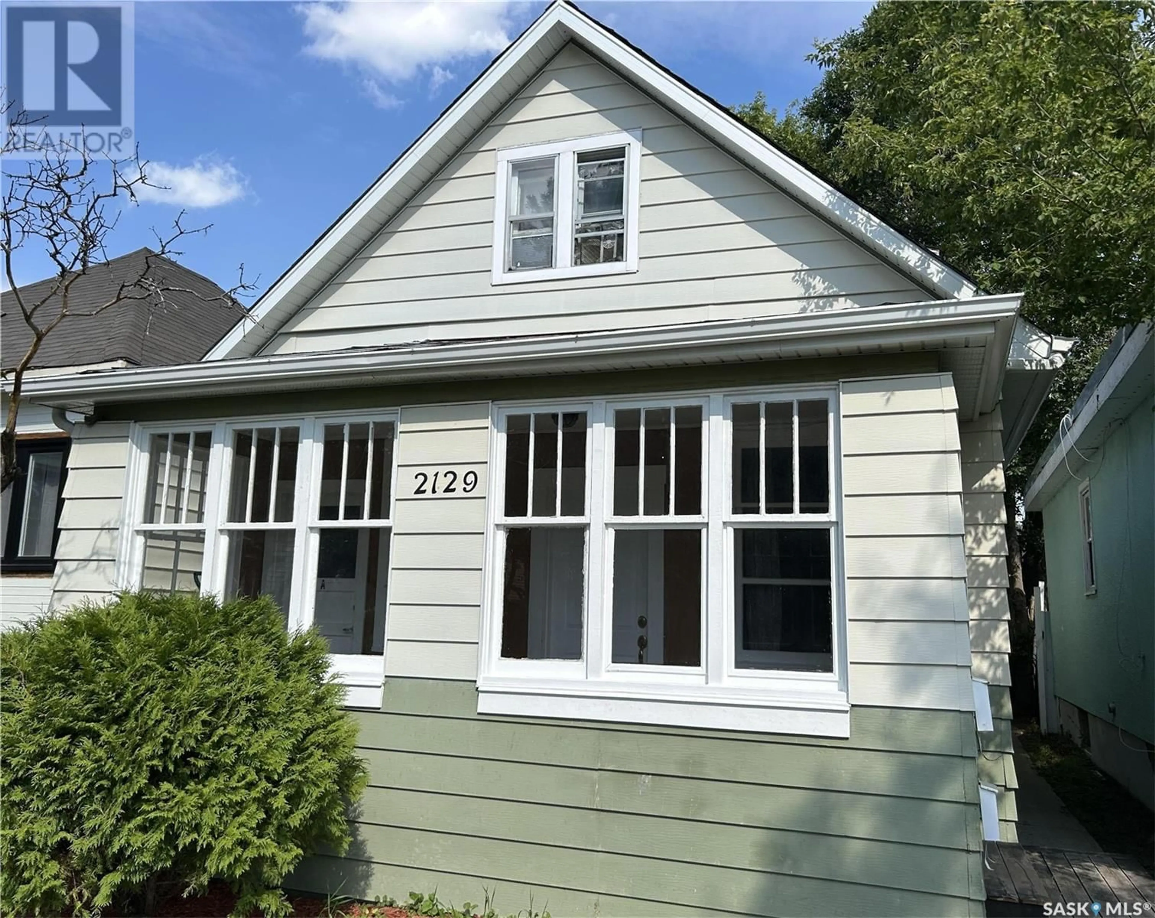 Home with vinyl exterior material, street for 2129 ATKINSON STREET, Regina Saskatchewan S4N3X1