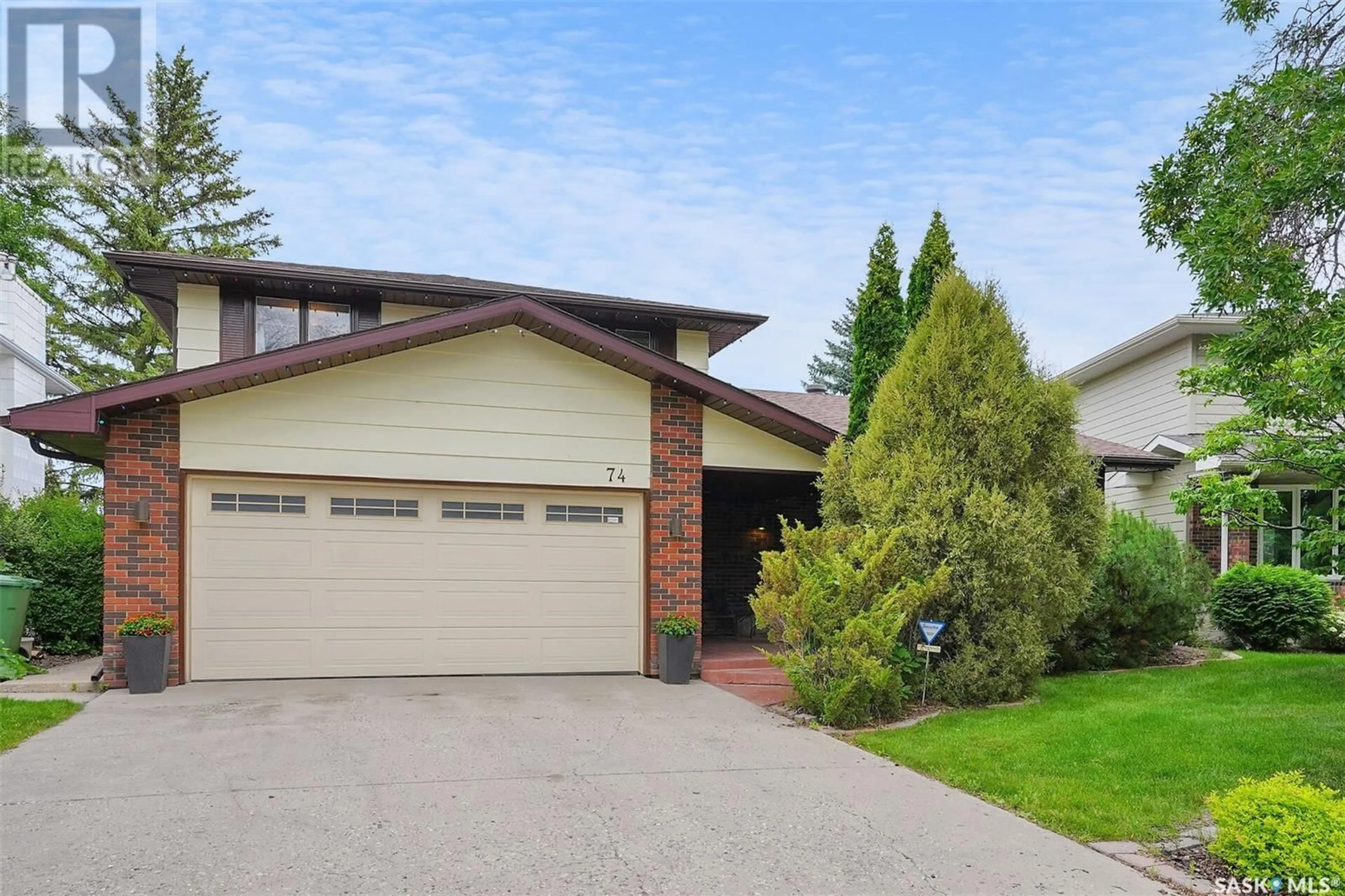 Home with brick exterior material, street for 74 SELKIRK CRESCENT, Regina Saskatchewan S4S6J4