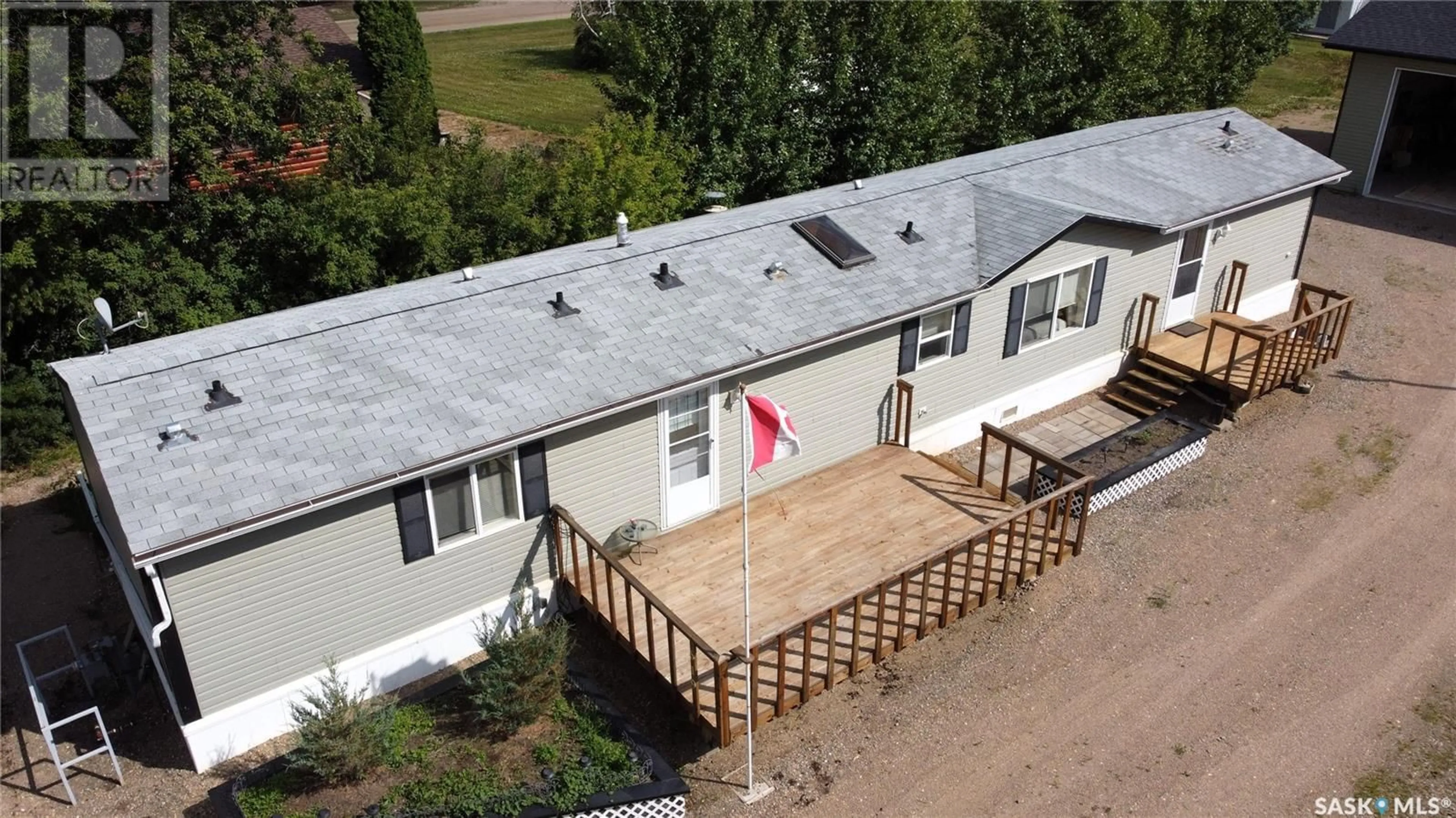 A pic from outside/outdoor area/front of a property/back of a property/a pic from drone, building for 619 1ST AVENUE, Choiceland Saskatchewan S0J0M0